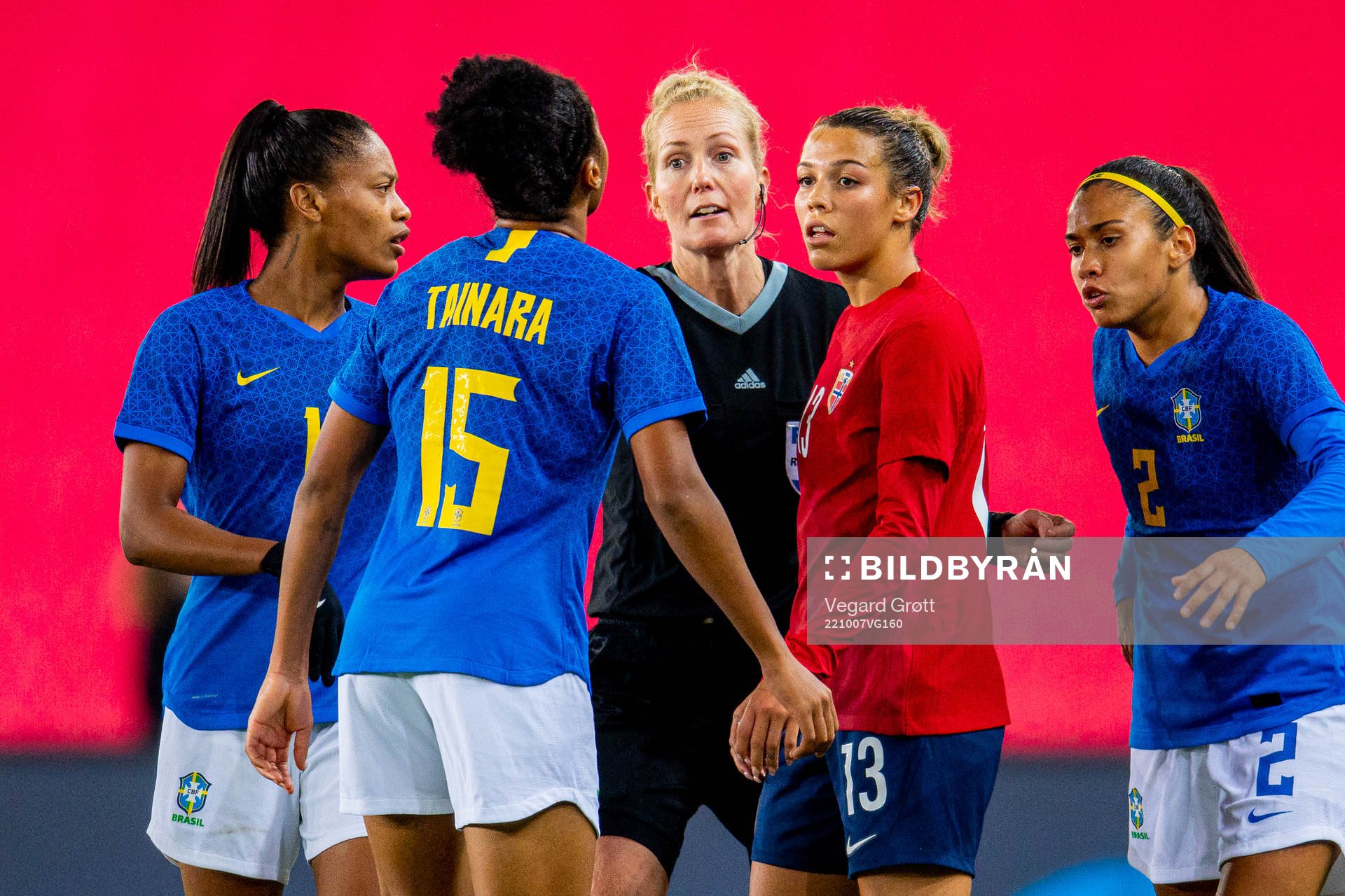 Tainara of Brazil, referee Lina Lehtovaara and Celin Bizet Ildhusøy of Norway during the international friendly football match between Norway and Brazil on October 7, 2022 in Oslo.