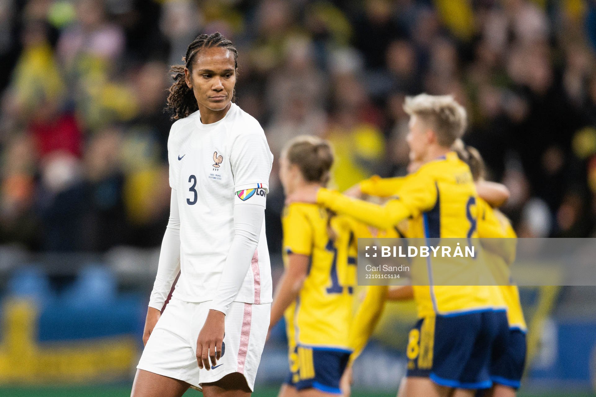 Wendie Renard of France looks dejected