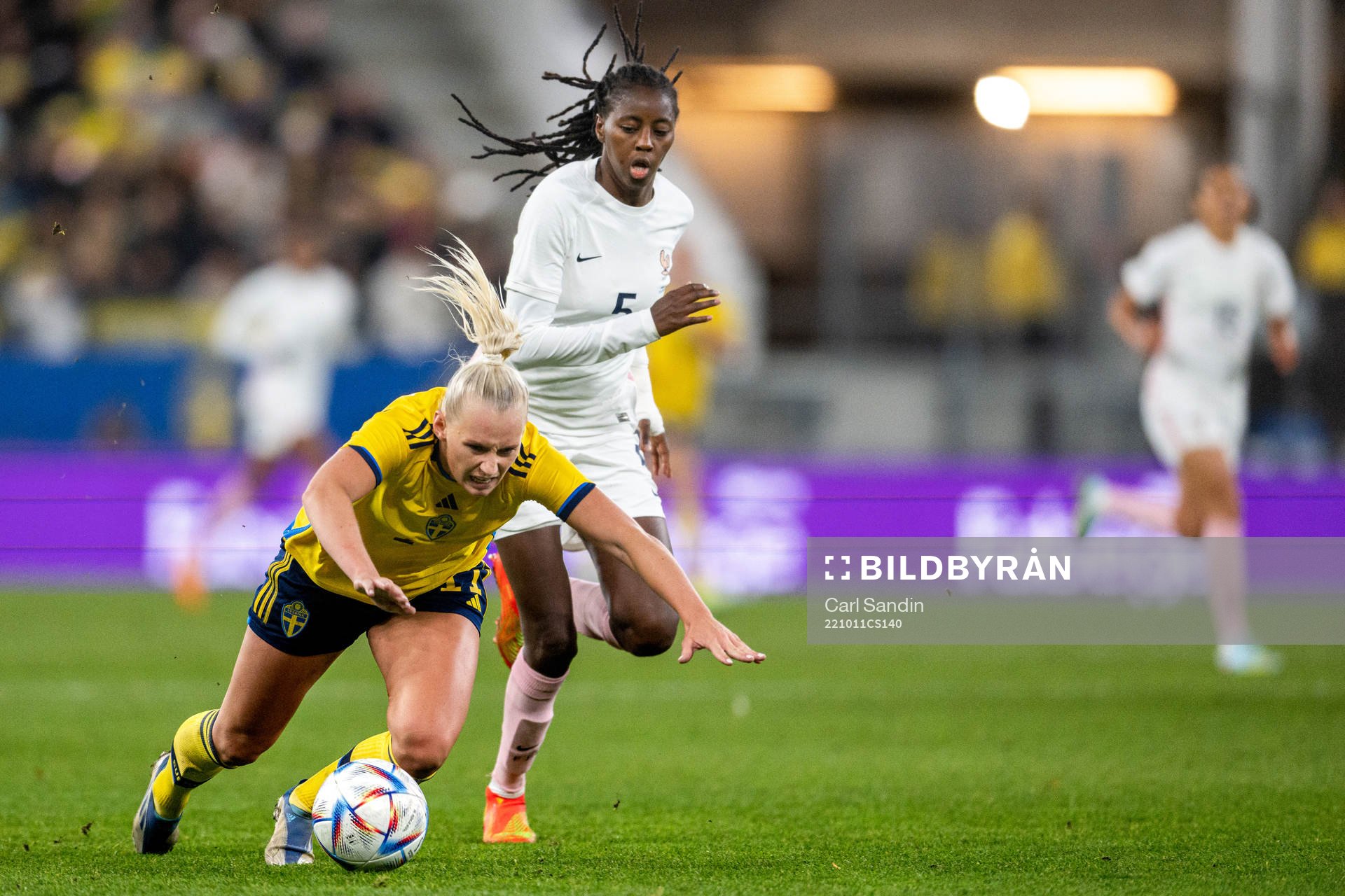 Stina Blackstenius of Sweden  and Aissatou Tounkara of
