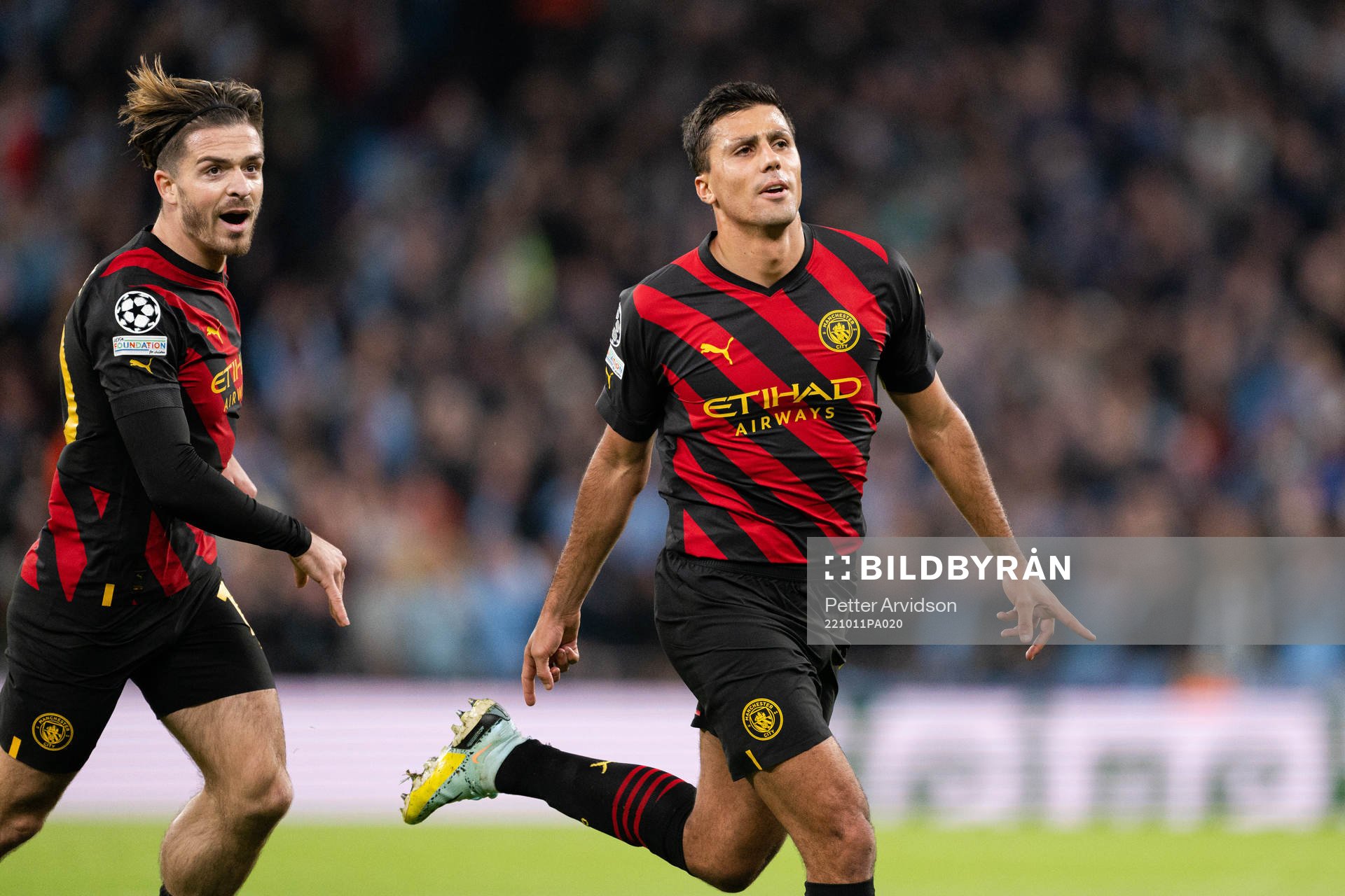 Jack Grealish and Rodri of Manchester City celebrate a goal