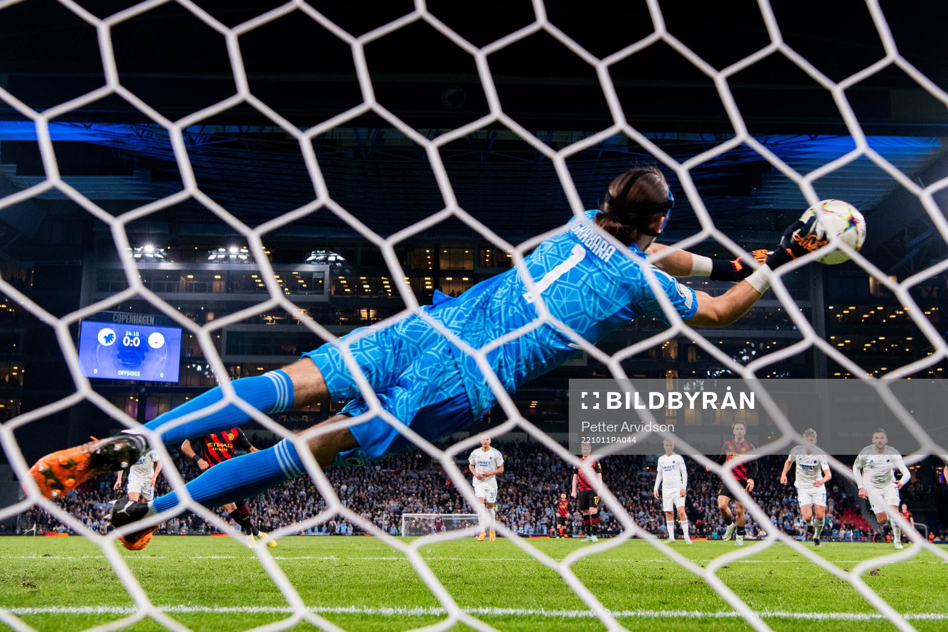 Goalkeeper Kamil Grabara of Copenhagen saves a penalty shot