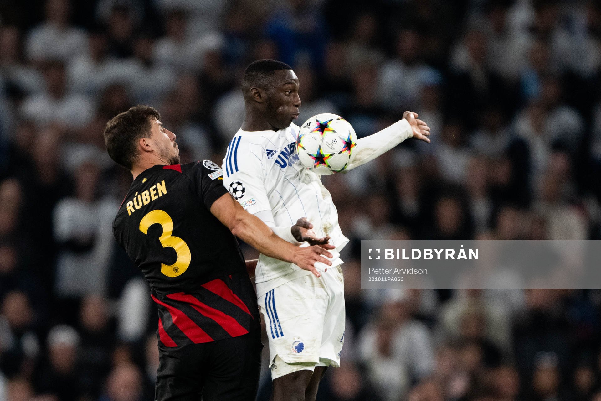 Ruben Dias of Man City and Mohamed Daramy of Copenhagen during the UEFA Champions League football match between FC Copenhagen and Manchester City on October 11, 2022 in Copenhagen.
