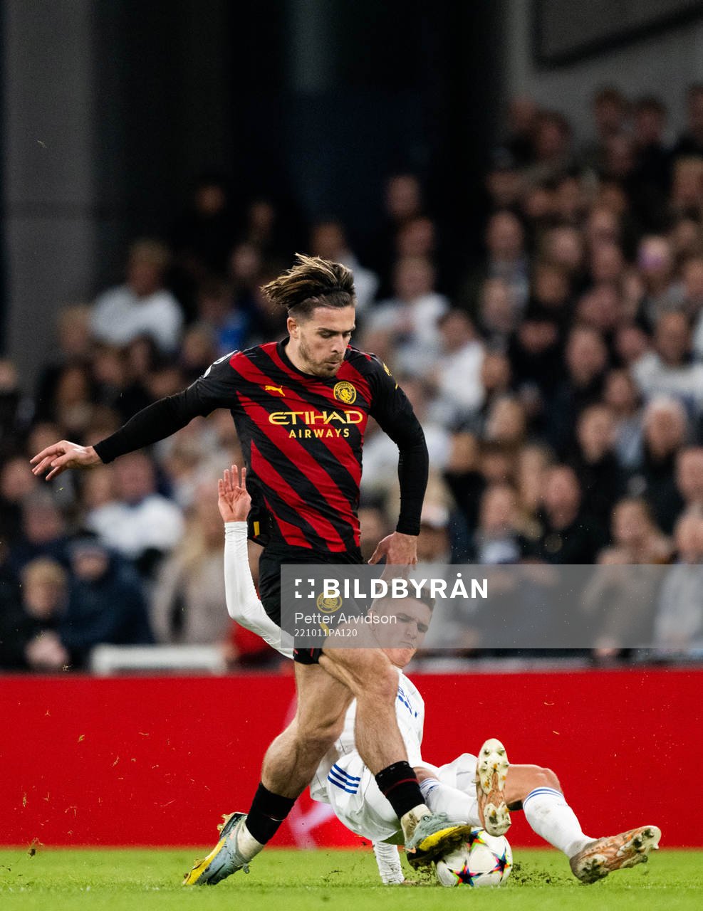 Jack Grealish of Man City and Elias Jelert of Copenhagen during the UEFA Champions League football match between FC Copenhagen and Manchester City on October 11, 2022 in Copenhagen.