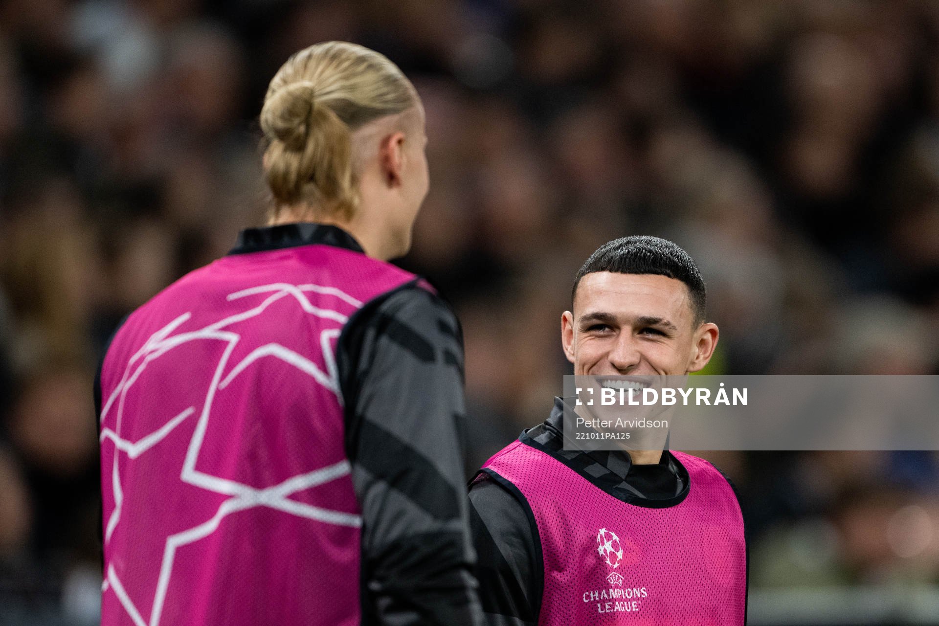 Erling Braut Haaland and Phil Foden of Man City
