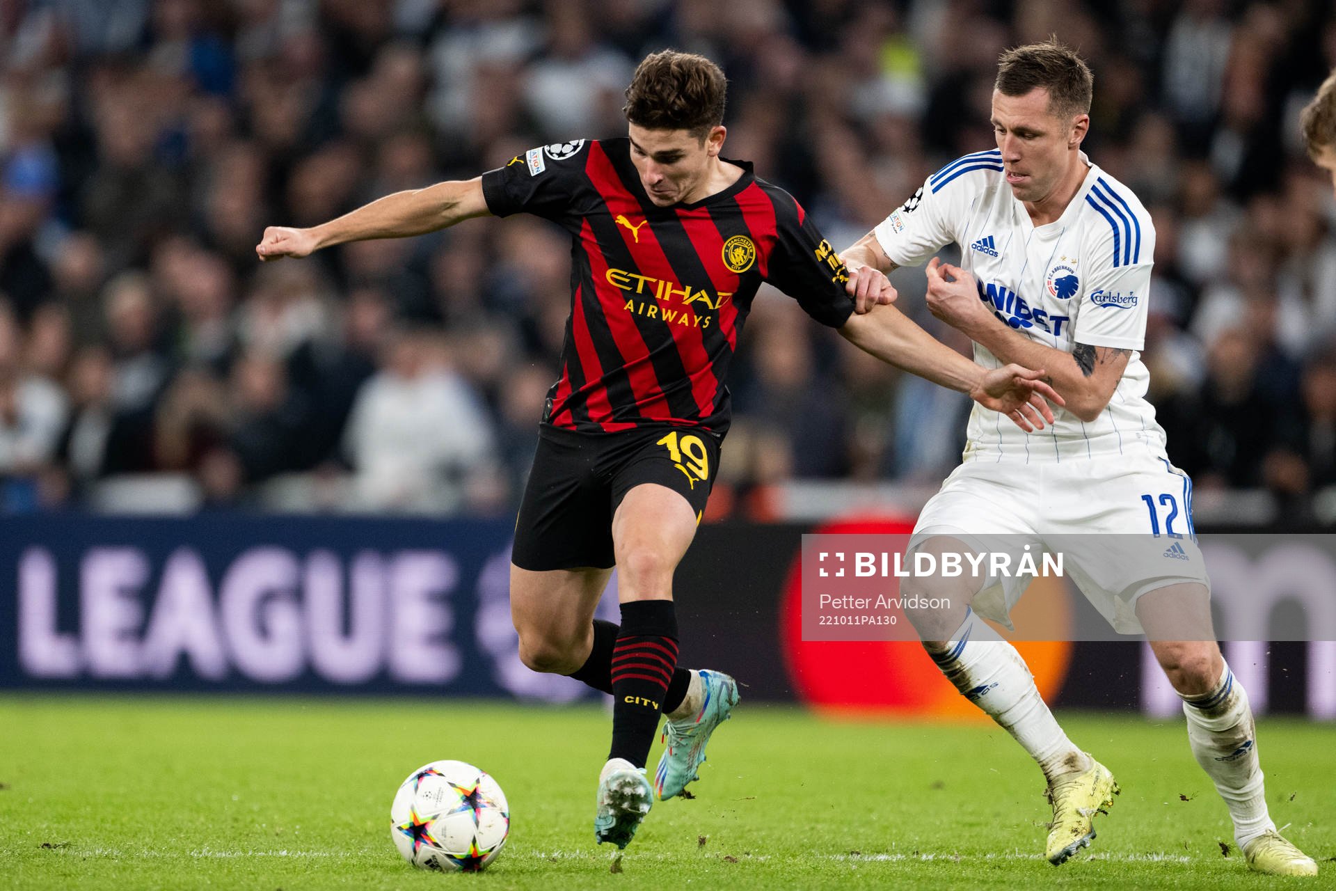 Julian Alvarez of Man City and Lukas Lerager of Copenhagen during the UEFA Champions League football match between FC Copenhagen and Manchester City on October 11, 2022 in Copenhagen.