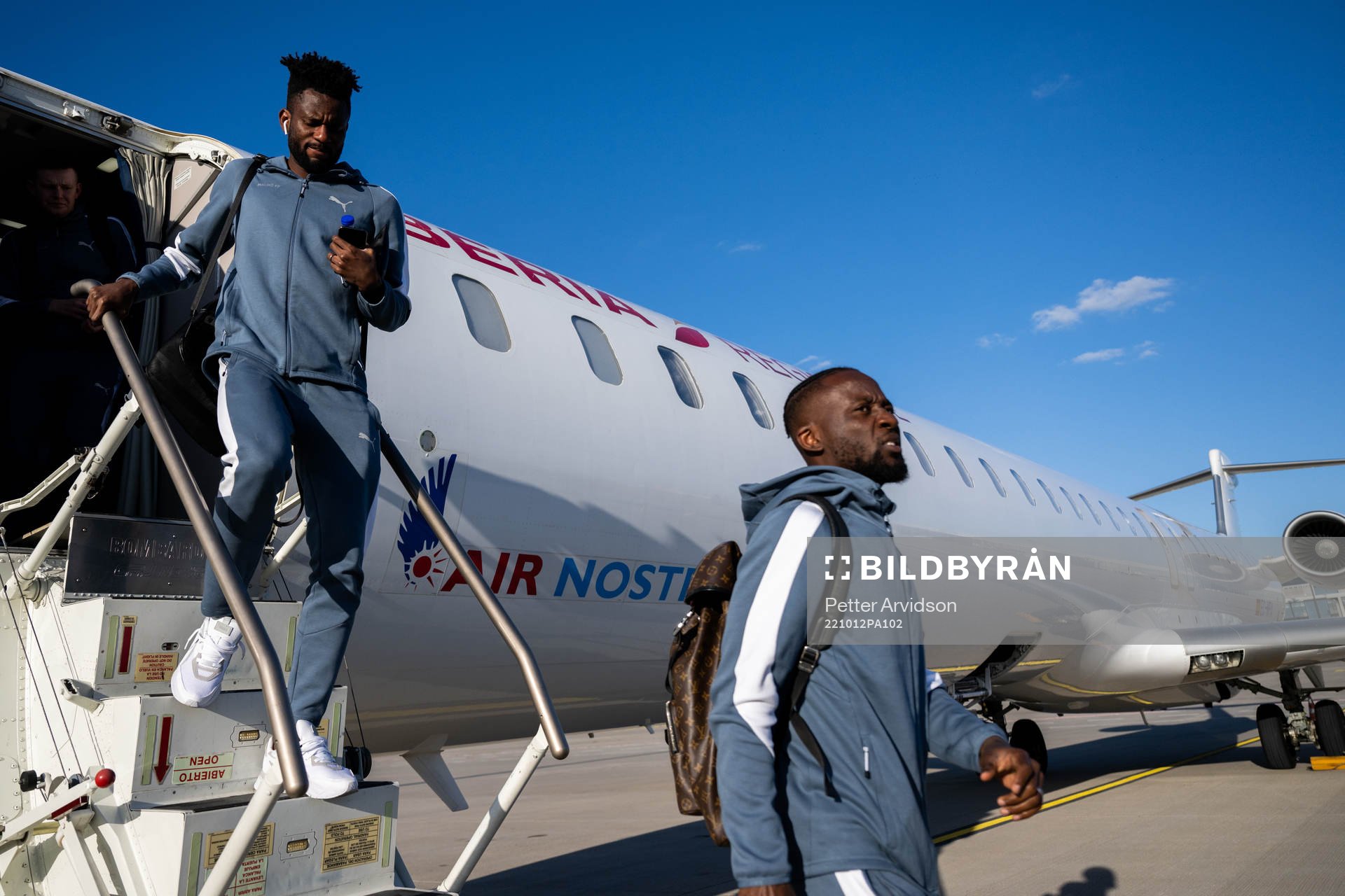 Emmanuel Lomotey and Mohamed Buya Turay arrives in Berlin during the team travel from Malmö to Berlin ahead of Europa League on October 12, 2022 in Berlin.