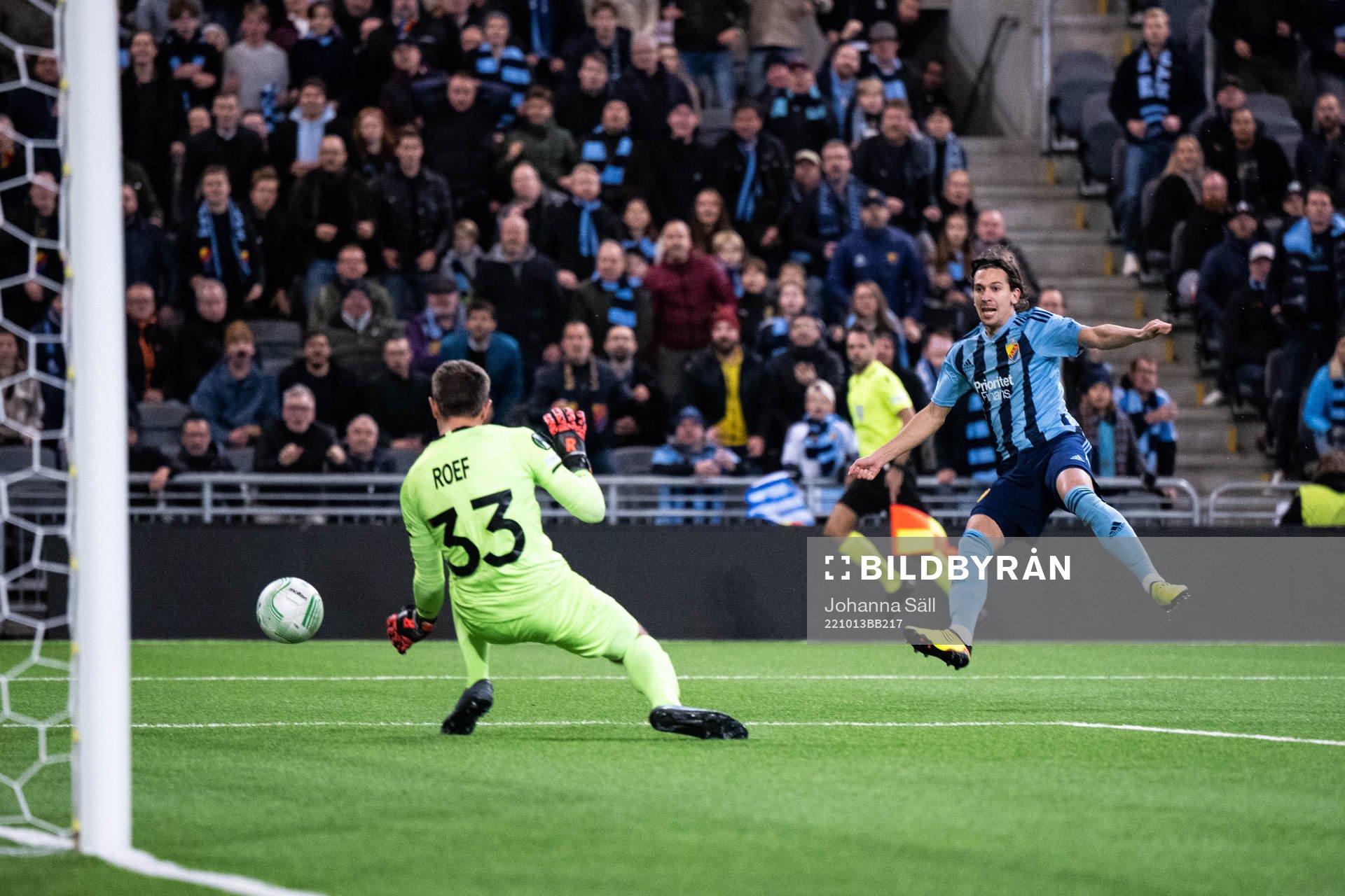 Gustav Wikheim of Djurgården and goalkeeper Davy Roef Verdedigers of Gent during the UEFA Conference League match between Djurgården and Gent on October 13, 2022 in Stockholm.