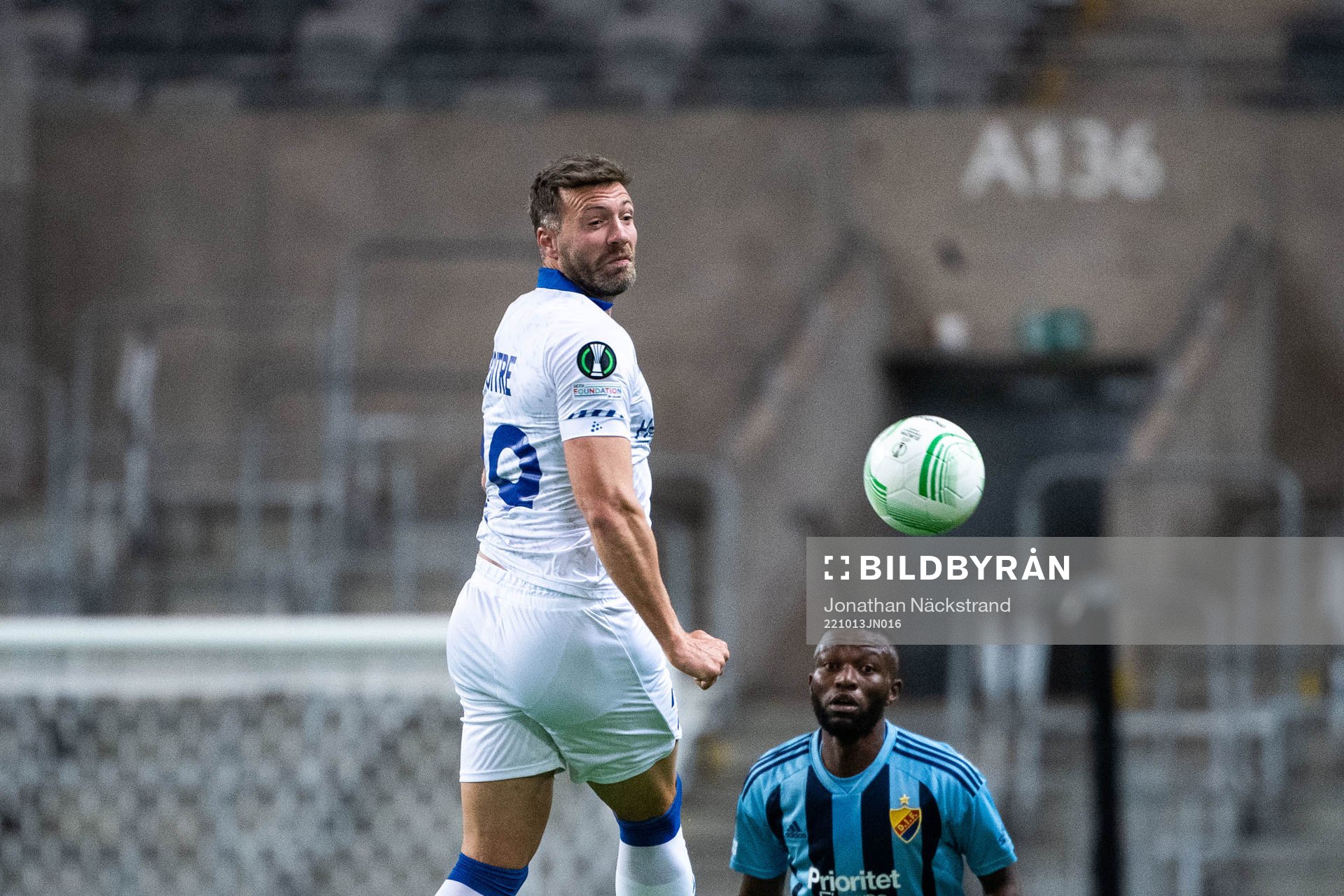 Laurent Depoitre of Gent and Emmanuel Justine Rabby Banda