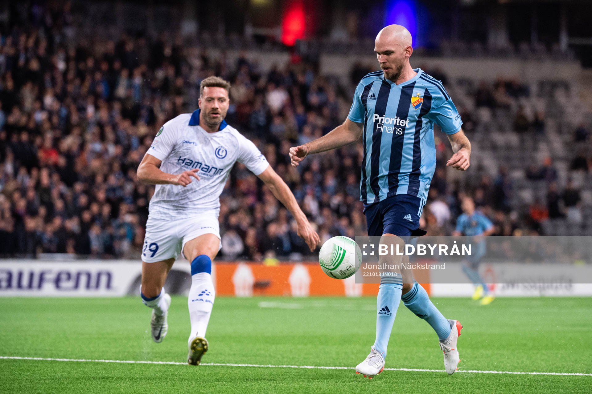 Laurent Depoitre of Gent and Marcus Danielson of Djurgården during the UEFA Conference League match between Djurgården and Gent on October 13, 2022 in Stockholm.