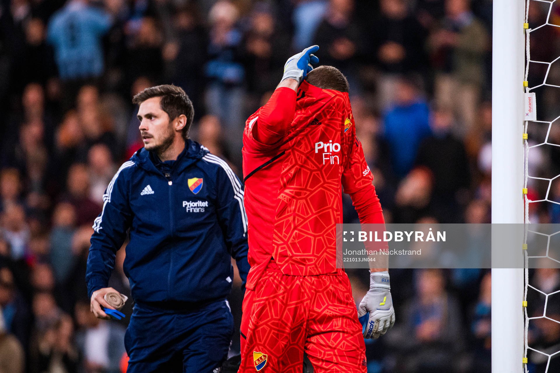 Goalkeeper Aleksandr Vasiutin of Djurgården in pain