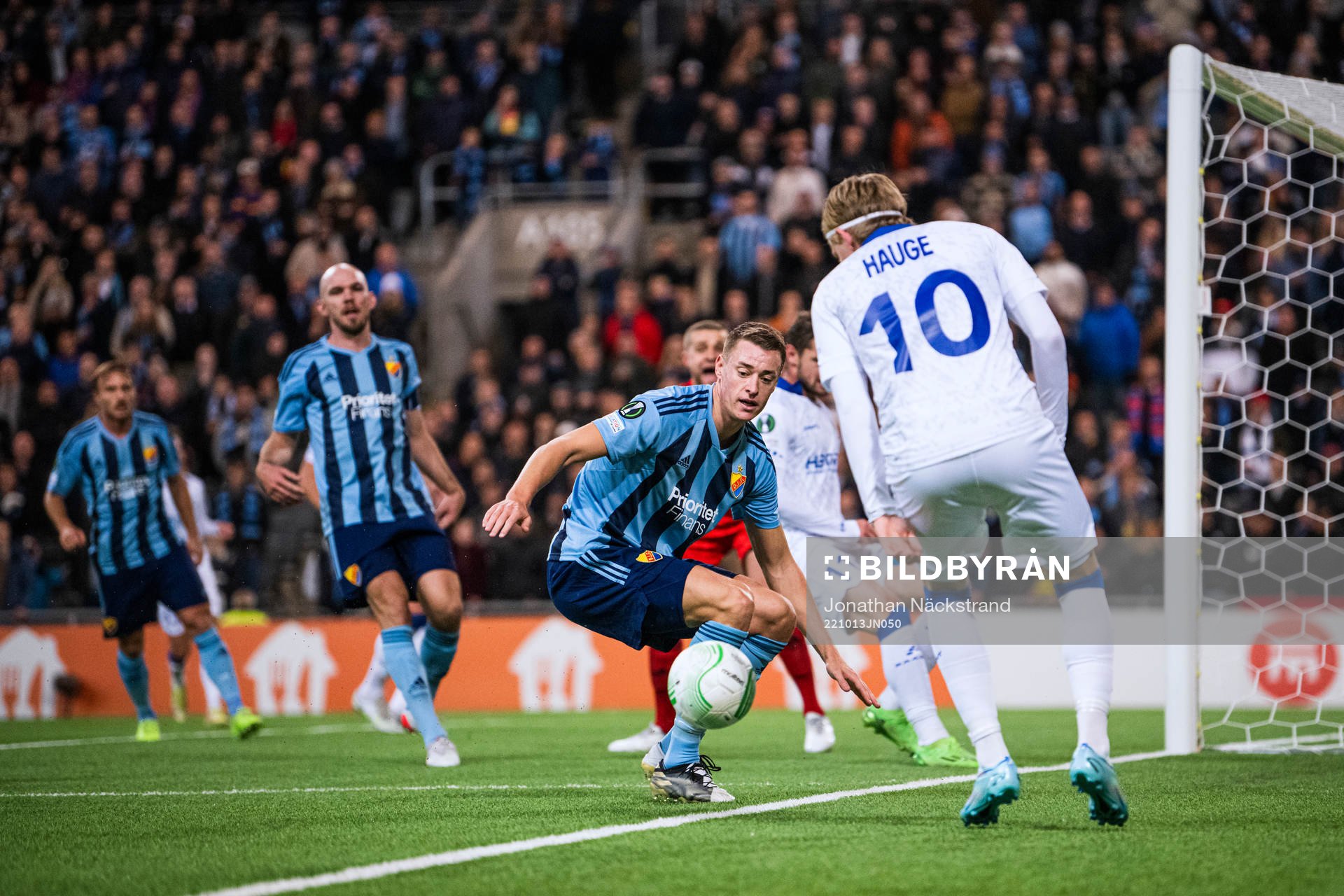 Jesper Löfgren of Djurgården and Jens Petter Hauge of Gent during the UEFA Conference League match between Djurgården and Gent on October 13, 2022 in Stockholm.