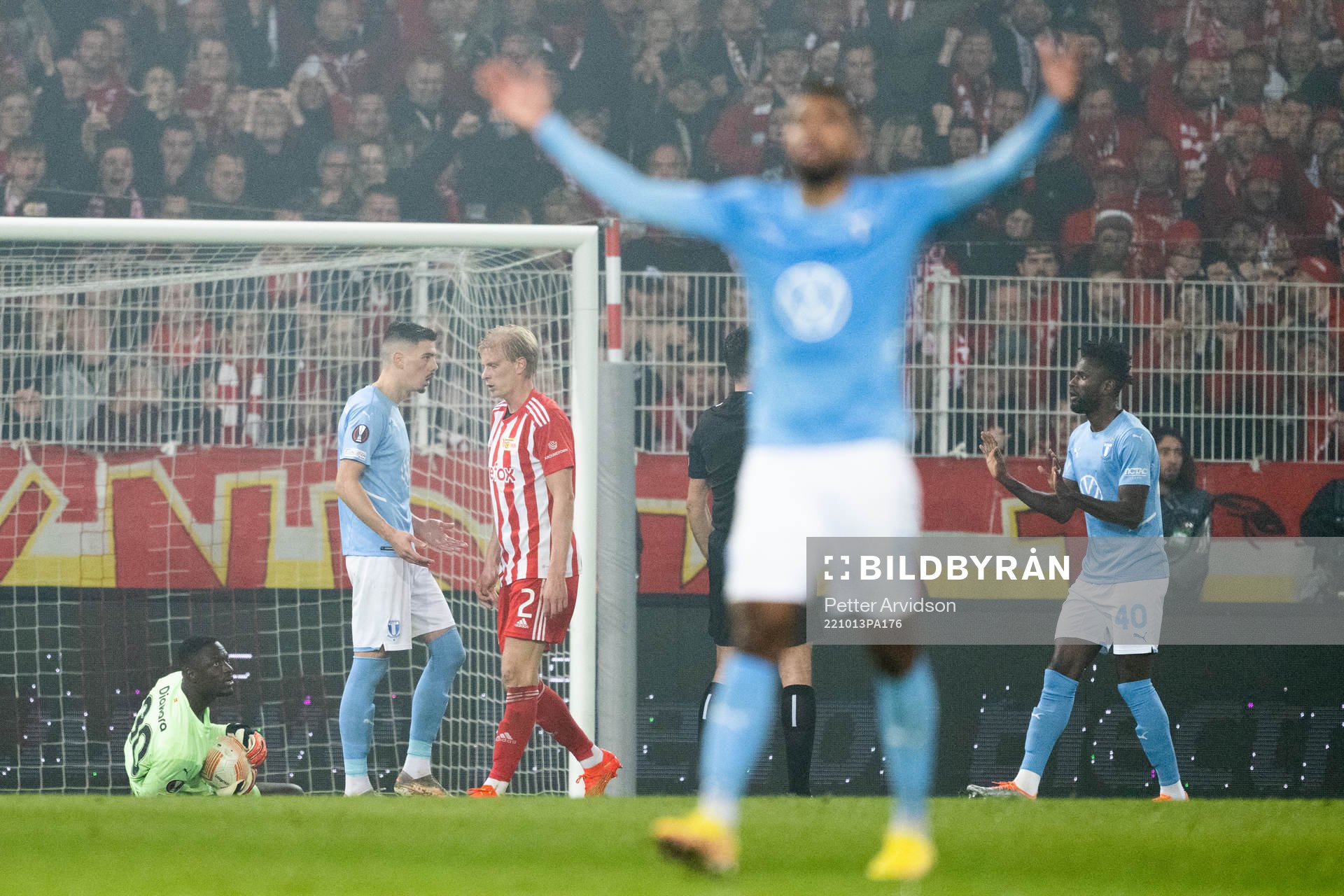 Emmanuel Lomotey of Malmö FF reacts as Referee Aleksandar