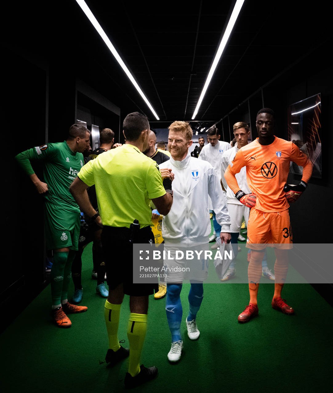 Anders Christiansen of Malmö greets referee Roi