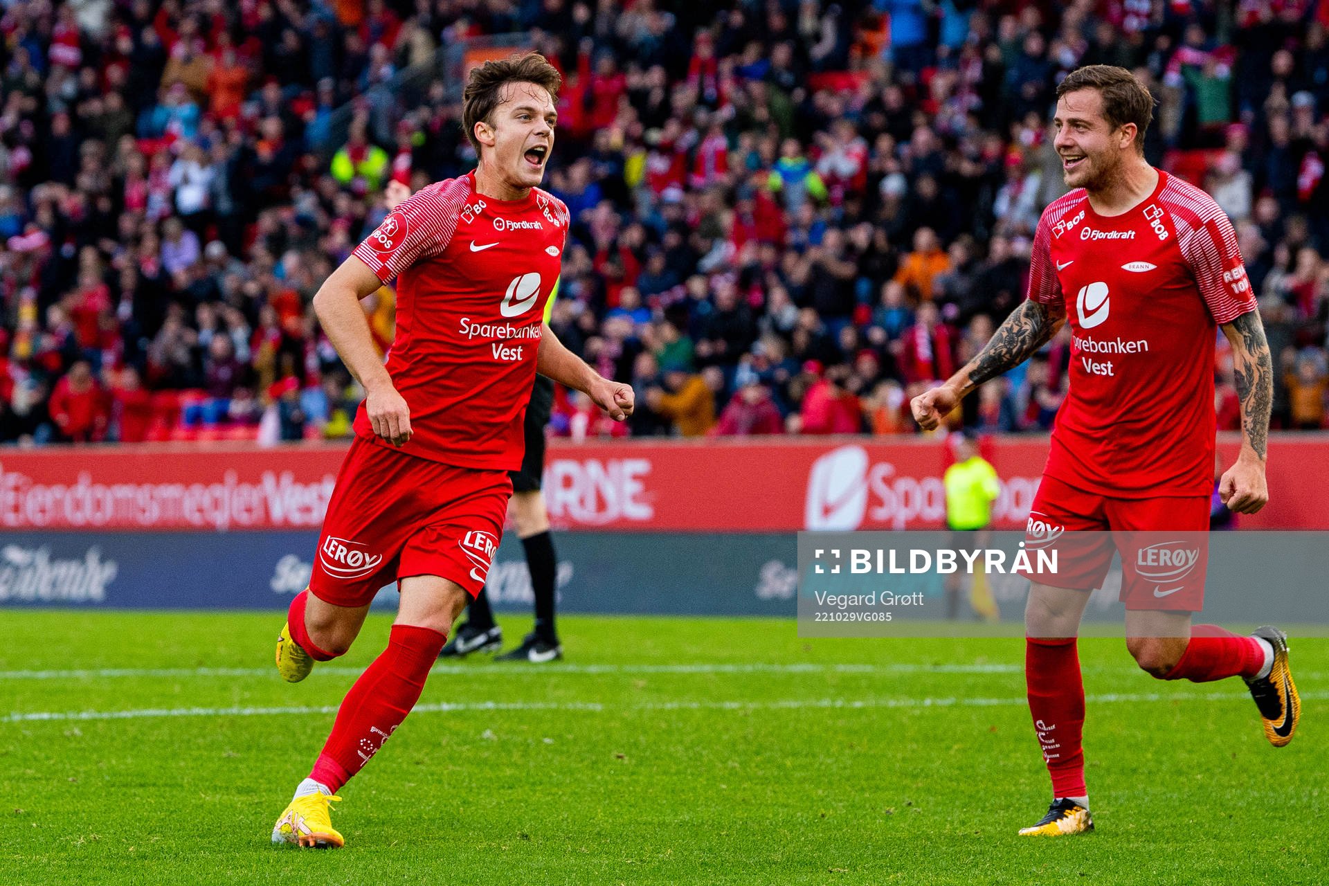 Felix Horn Myhre of Brann celebrates with teammate Frederik
