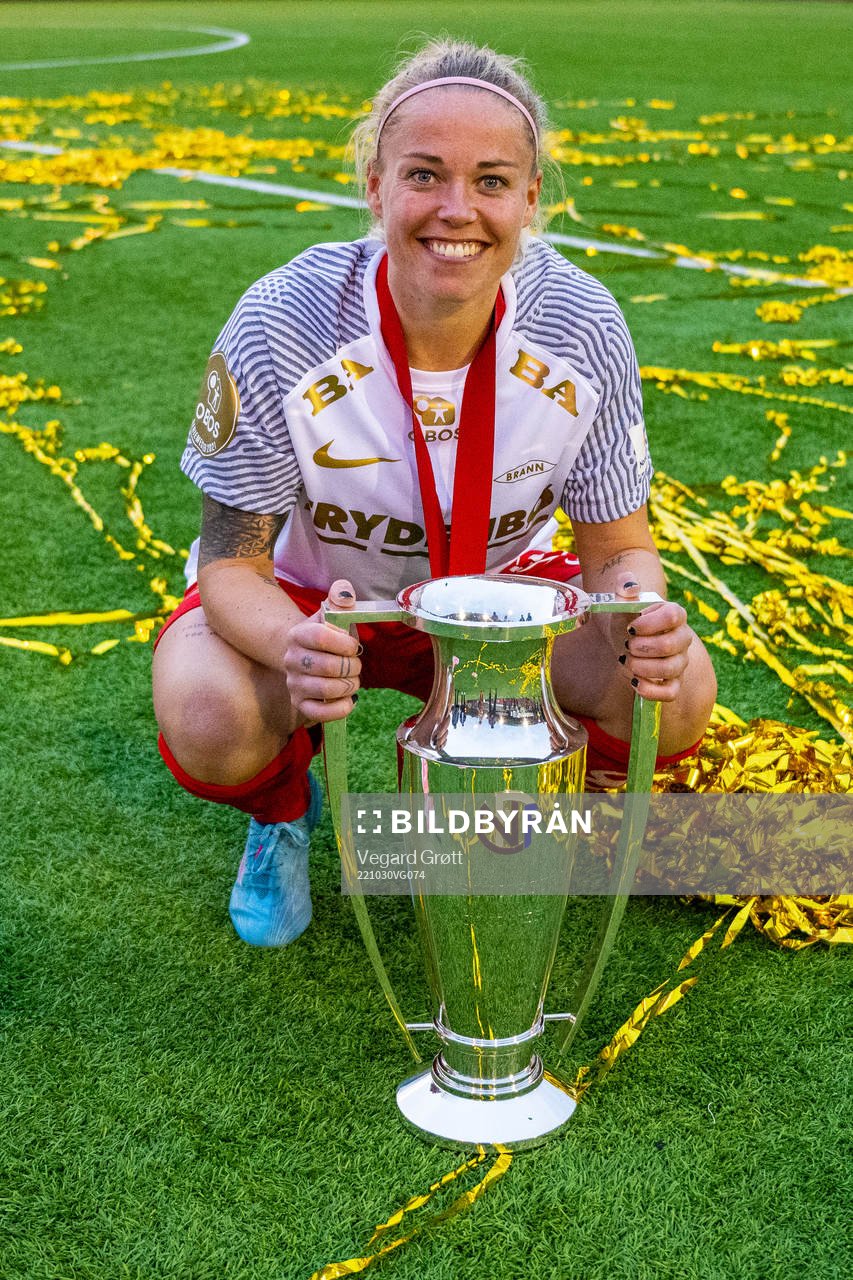 Therese Sessy Åsland of Brann celebrates with the trophy