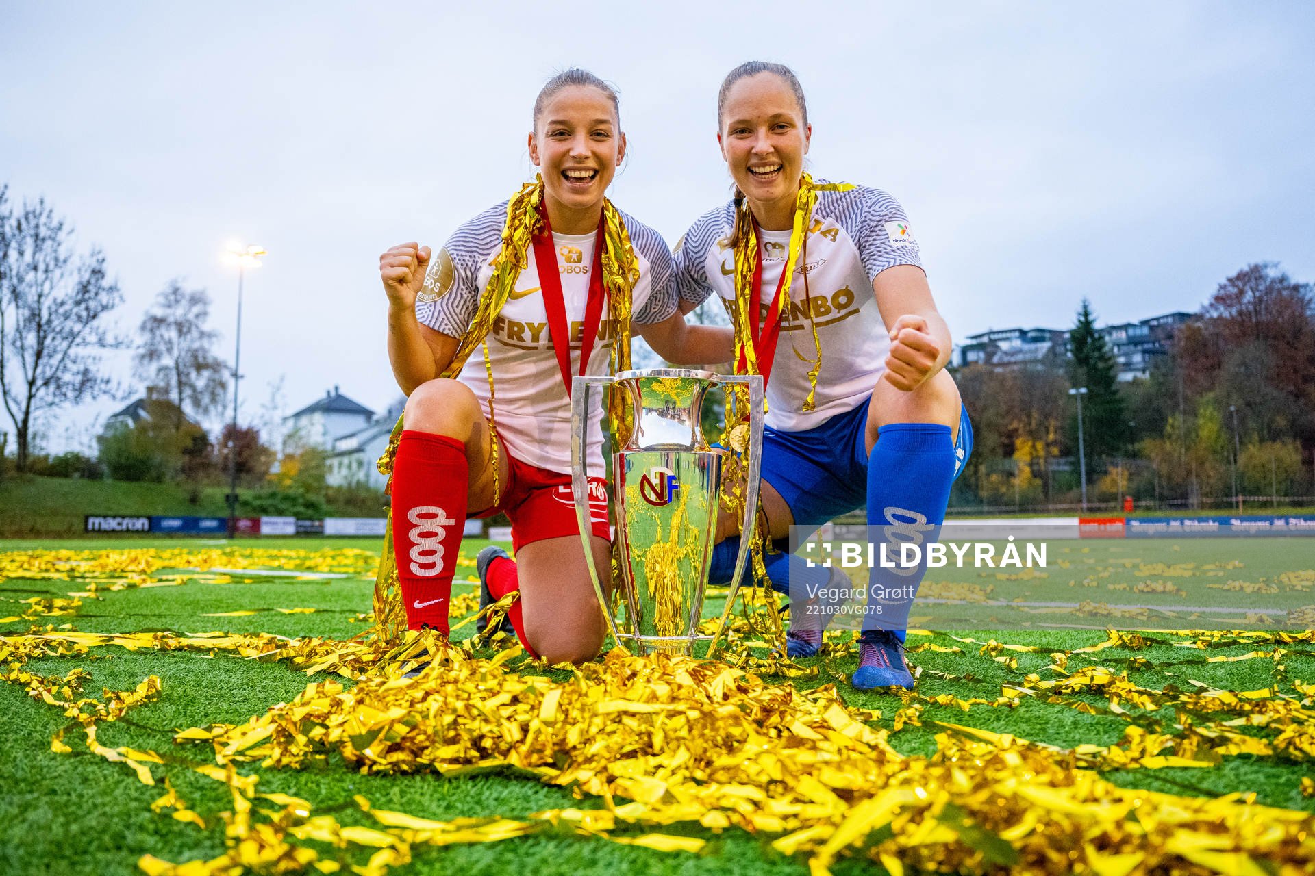 Rikke Bogetveit Nygard and goalkeeper Aurora Mikalsen of Brann celebrate with the trophy after the Toppserien football match between Brann and Vålerenga on October 30, 2022 in Sandviken.