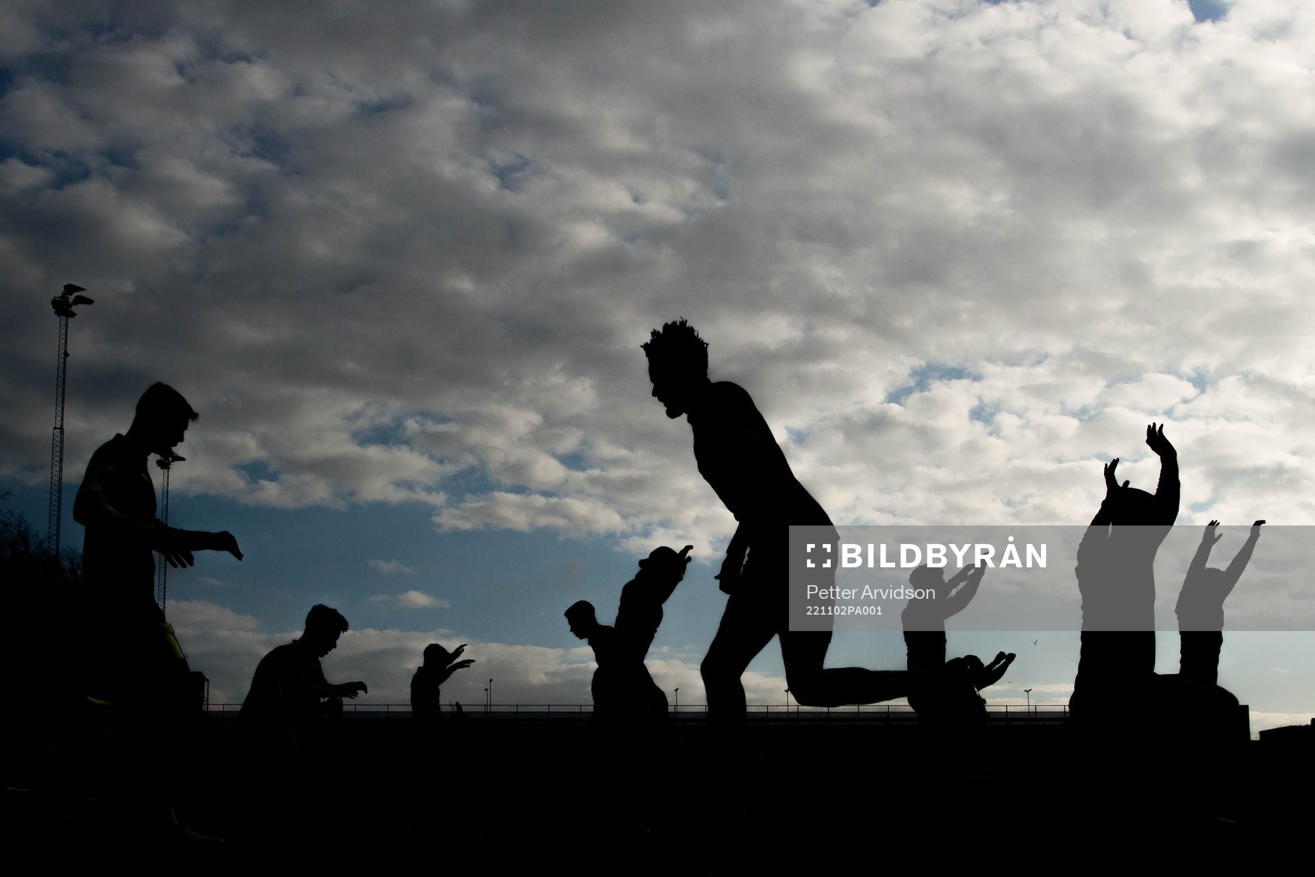 Players in silhouette