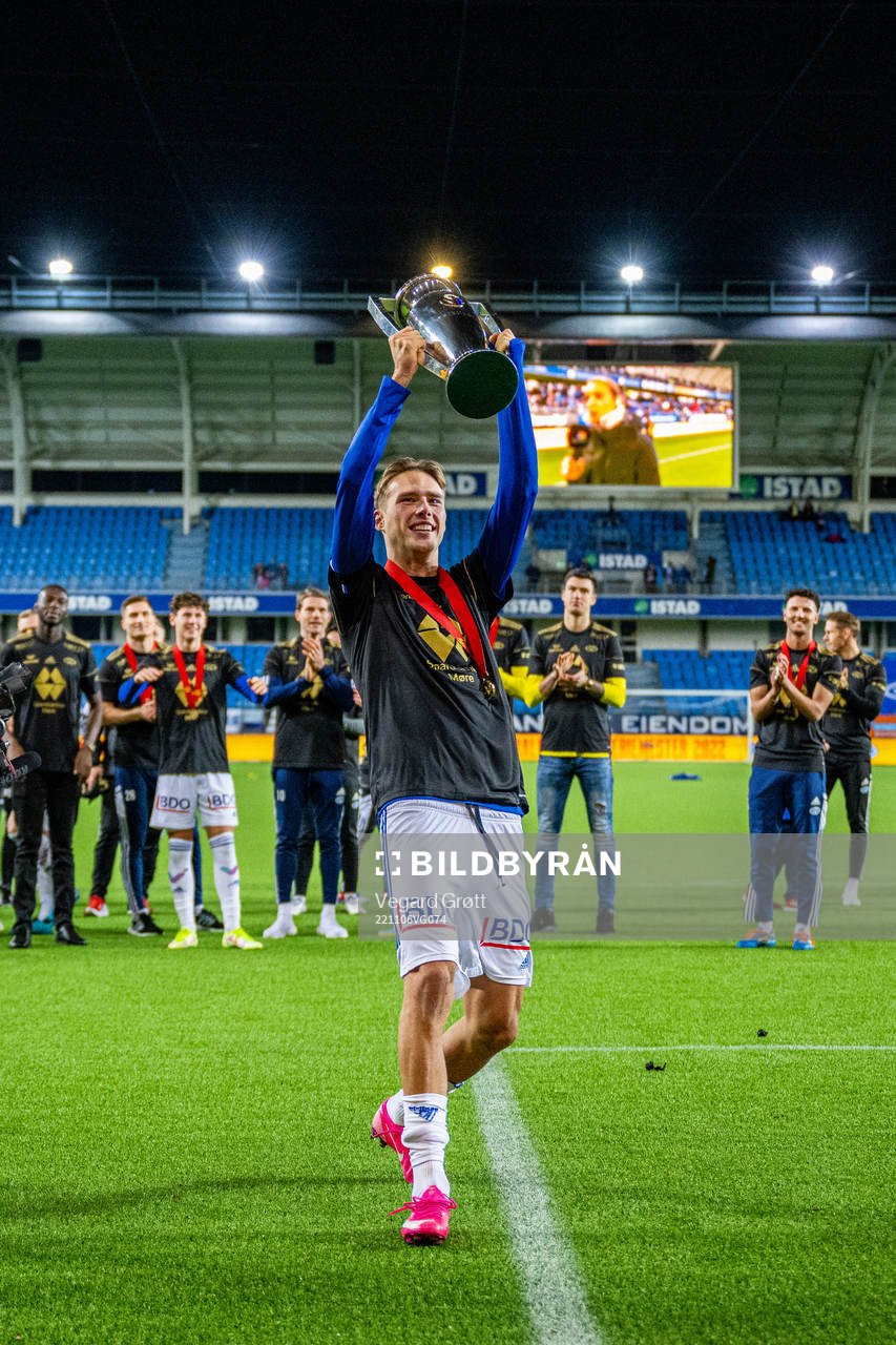 Magnus Retsius Grødem of Molde celebrates with the trophy