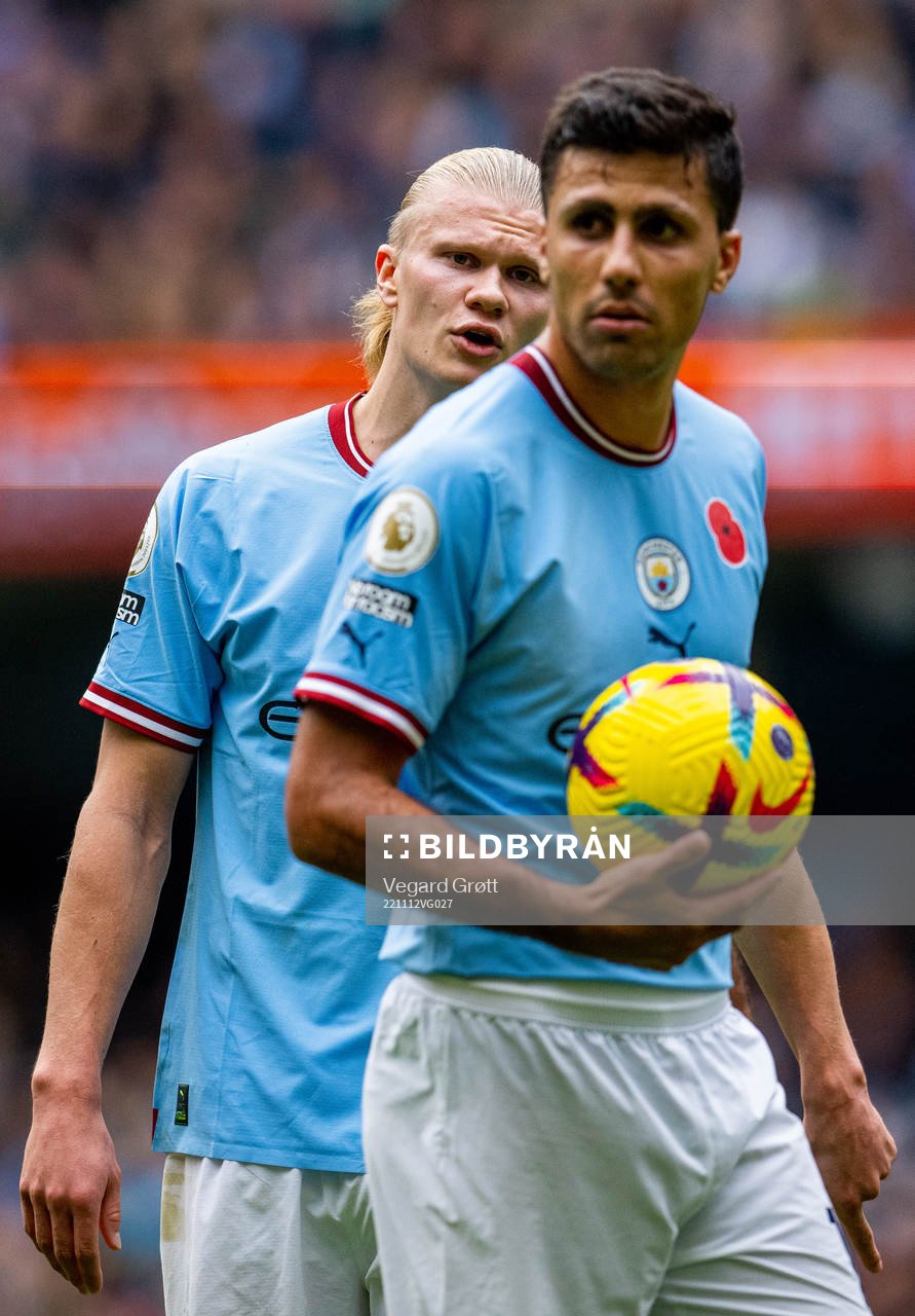 Erling Braut Haaland and Rodri of Manchester City