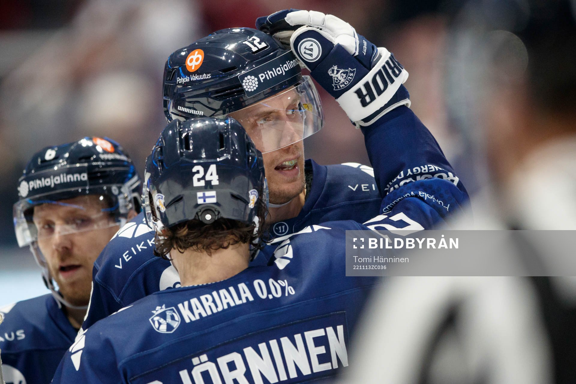 Marko Anttila of Finland celebrates with teammates