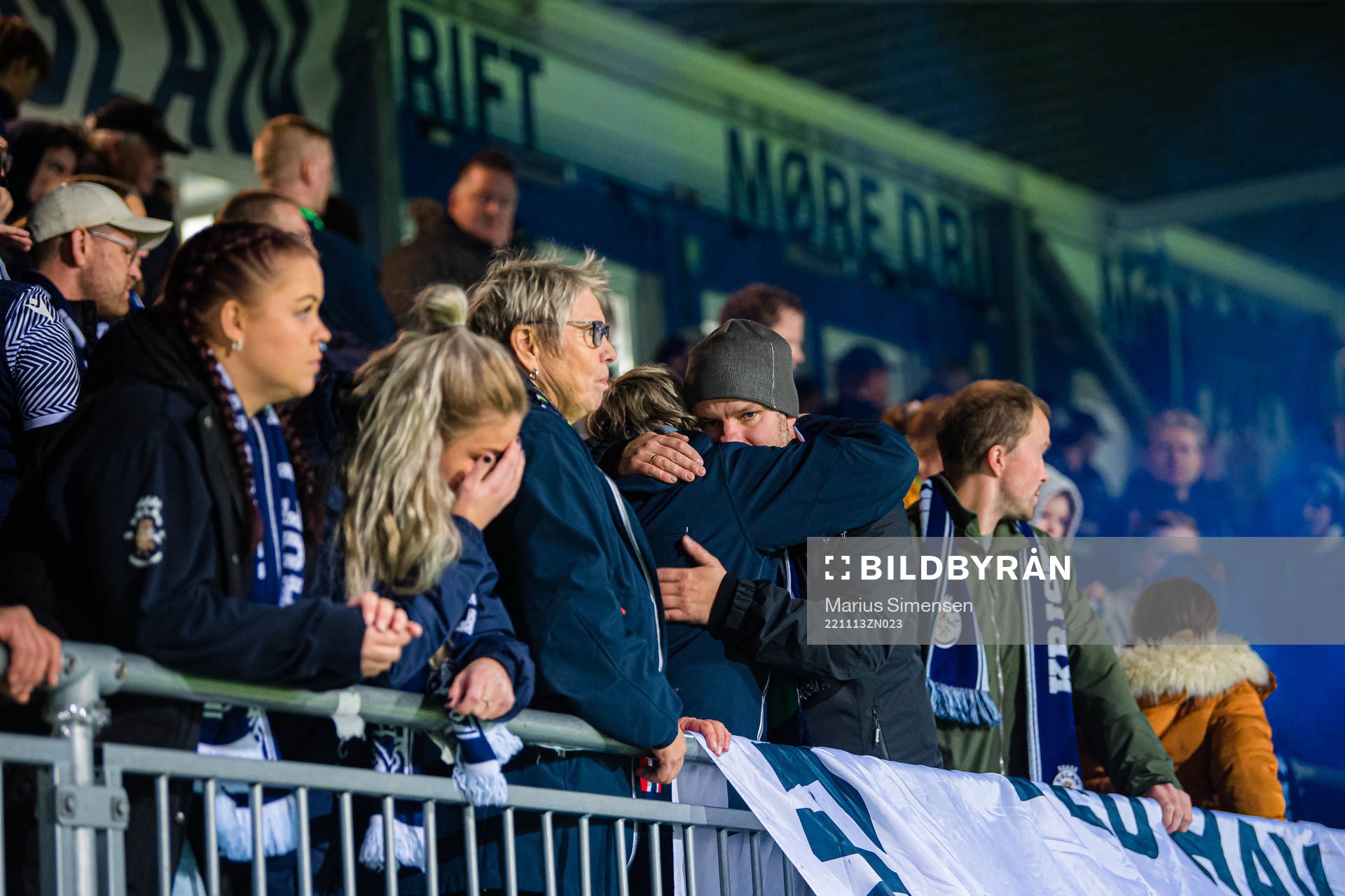 Spectators in the stands looks dejected
