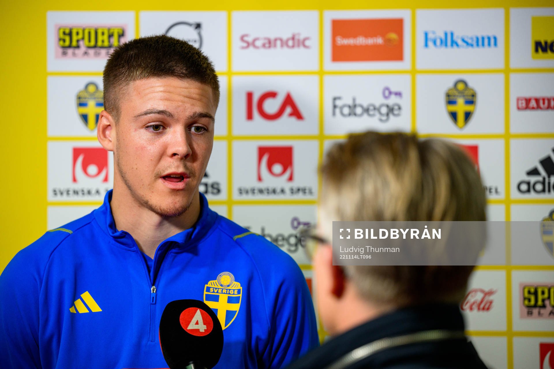 Emil Holm of the Swedish national football team is interviewed by the media during a mixed zone after a training session on November 14, 2022 in Girona.