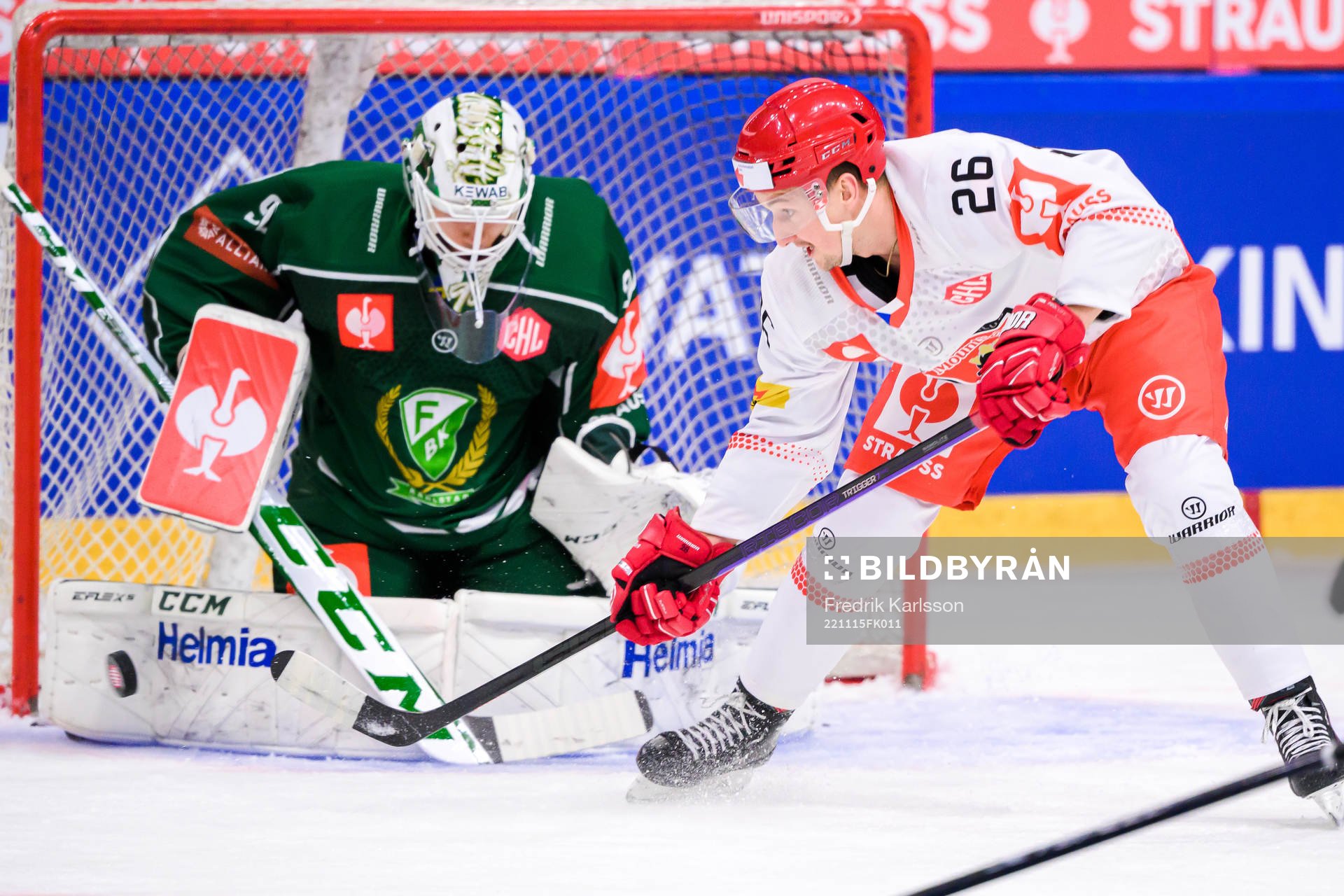 goaltender Dennis Hildeby  of Färjestad and Ales Jergi of
