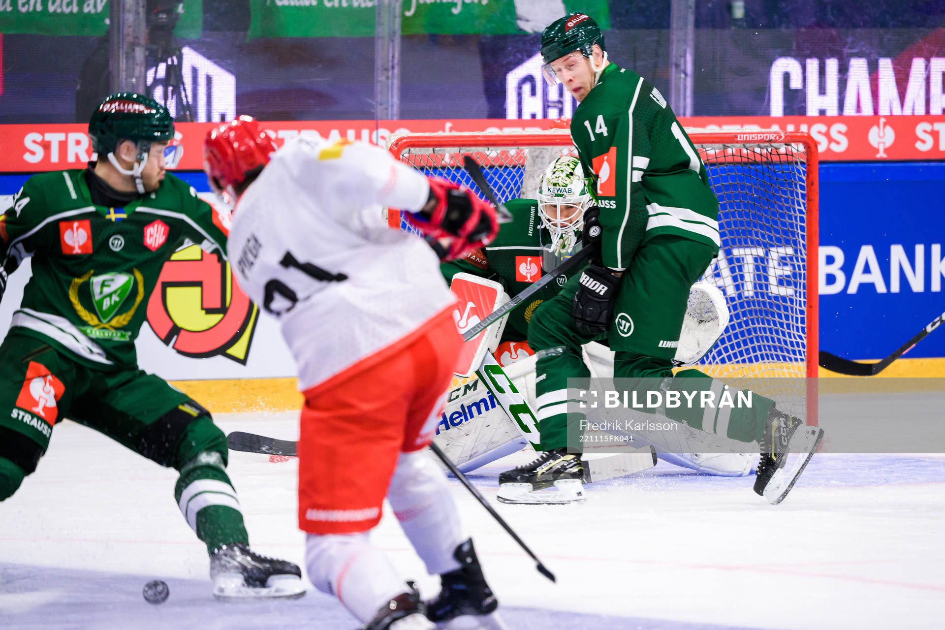 goaltender Matthew Tomkins  and Victor Ejdsell of Färjestad