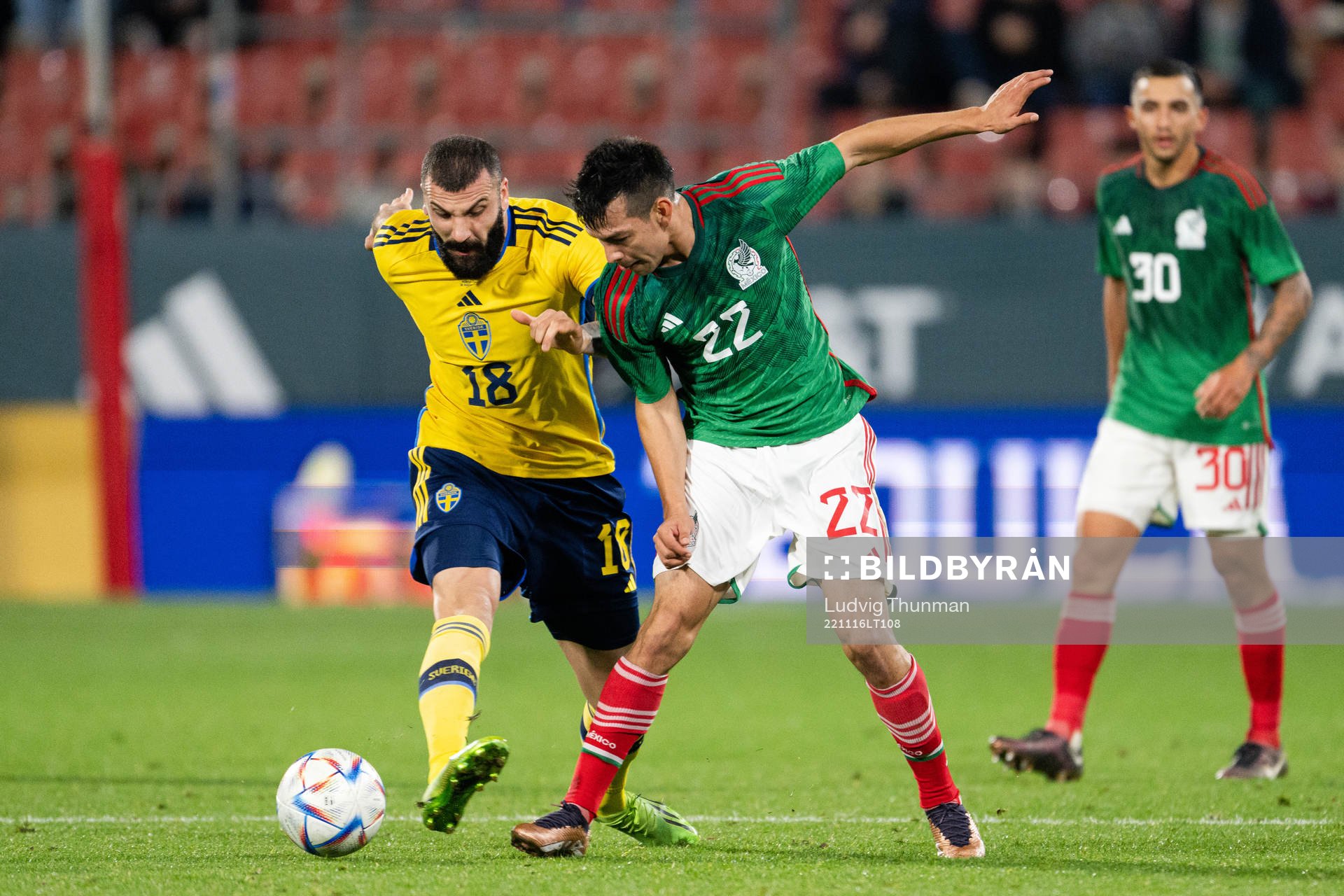 Mikael Ishak of Sweden and Hirving Lozano of Mexico