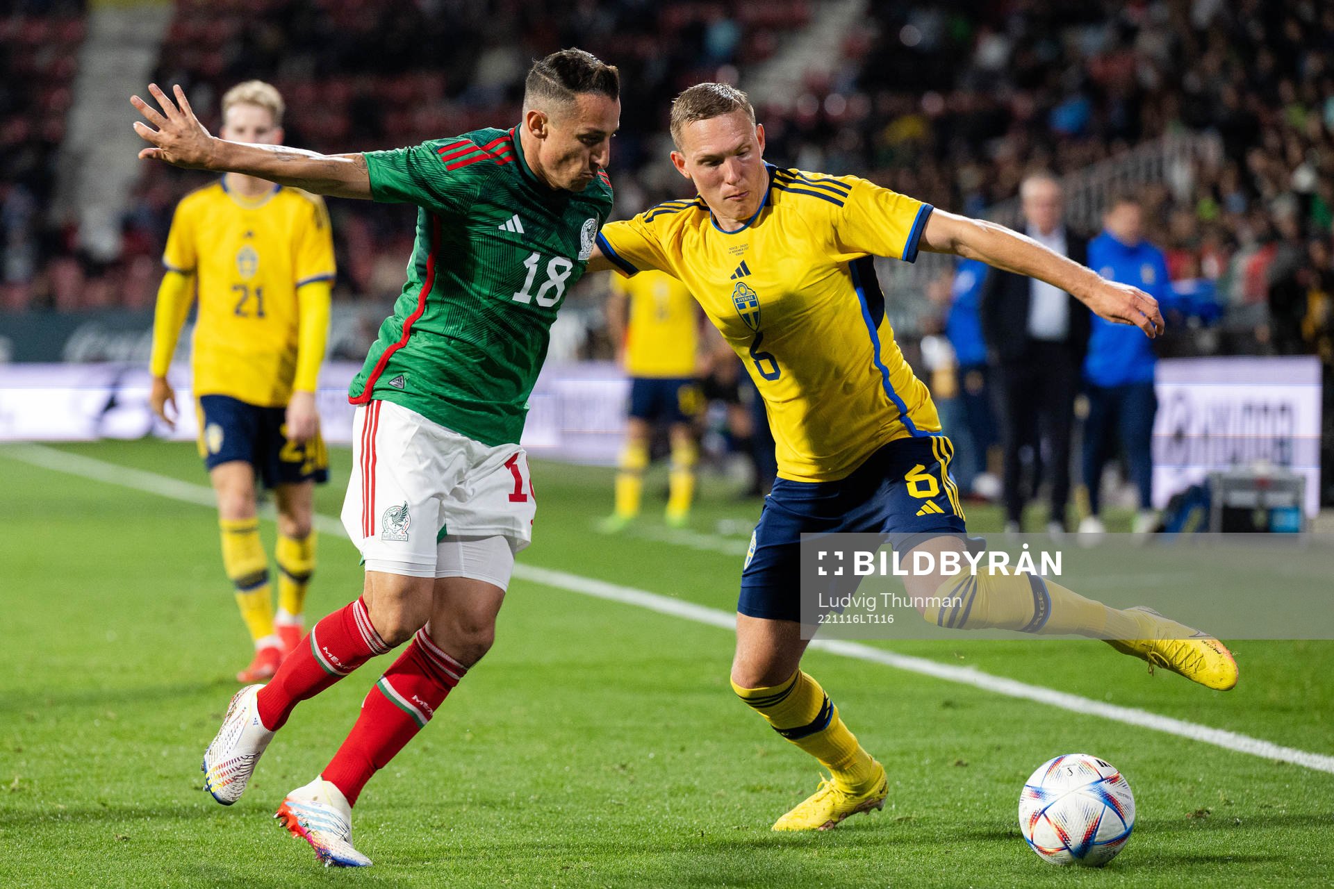 Andres Guardado of Mexico and Ludwig Augustinsson of Sweden during the international friendly football match between Mexico and Sweden on November 16, 2022 in Girona.