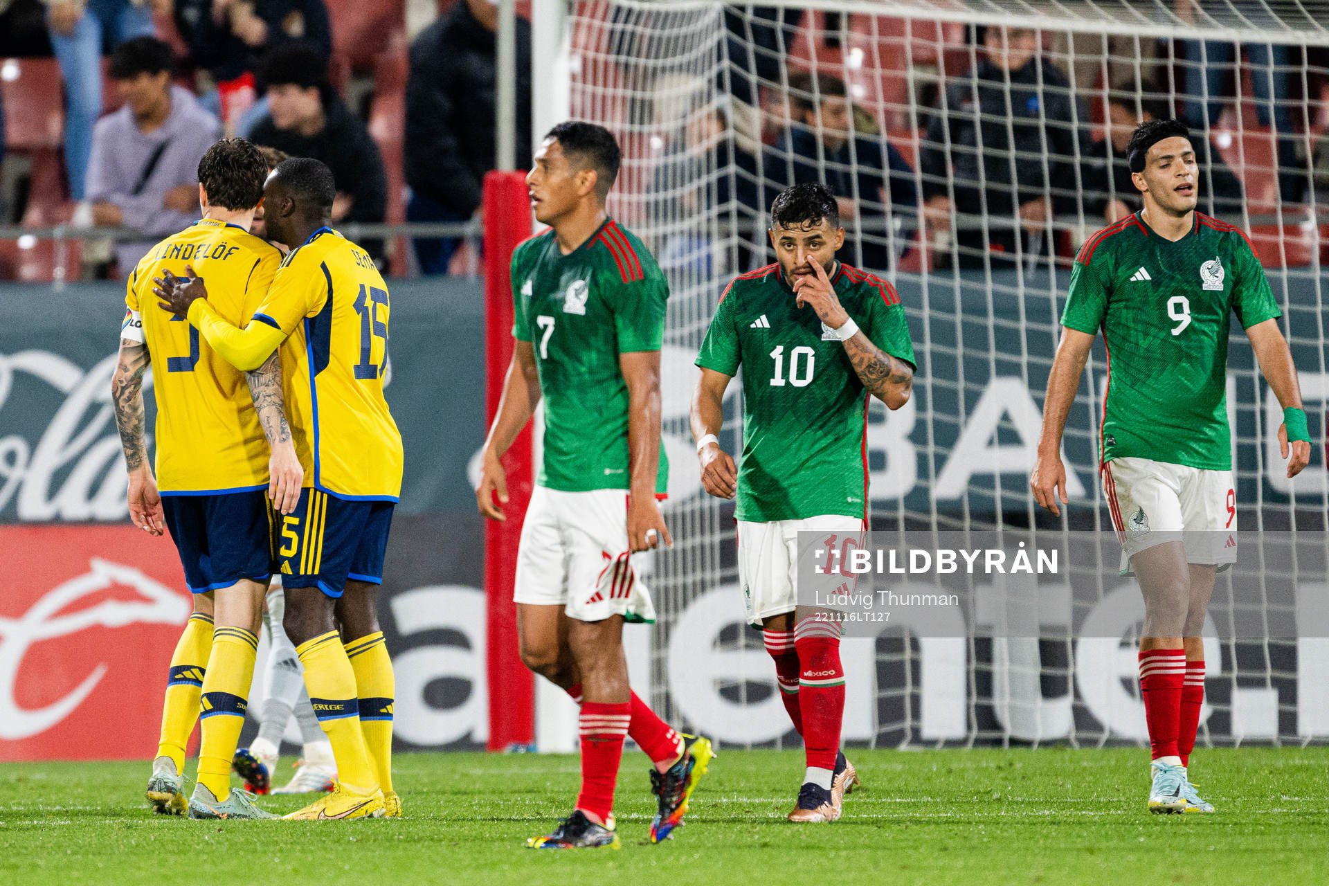 Luis Romo, Alexis Vega and Raul Jimenez of Mexico look