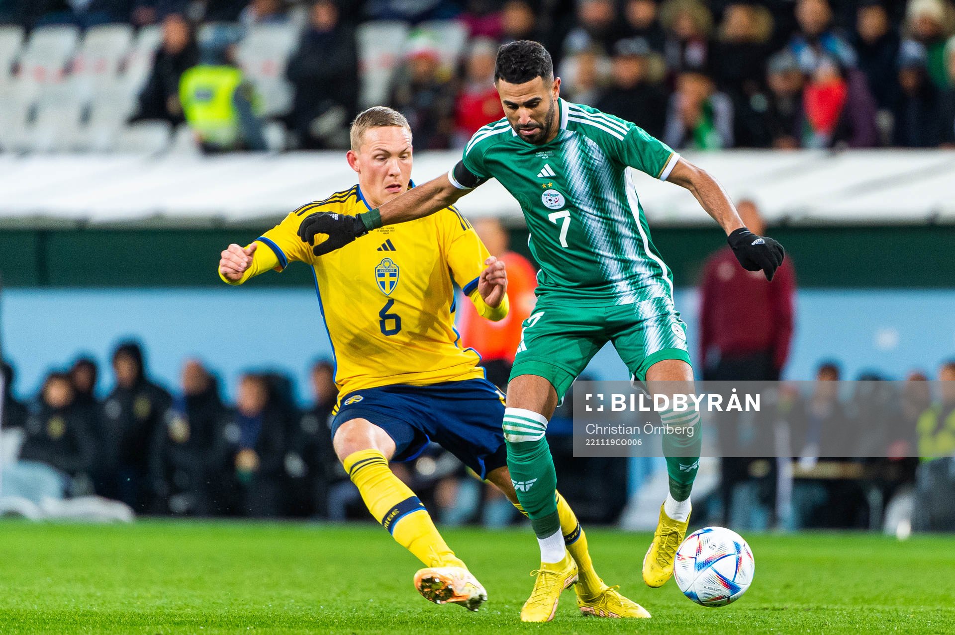 Ludwig Augustinsson of Sweden and Riyad Mahrez of Algeria