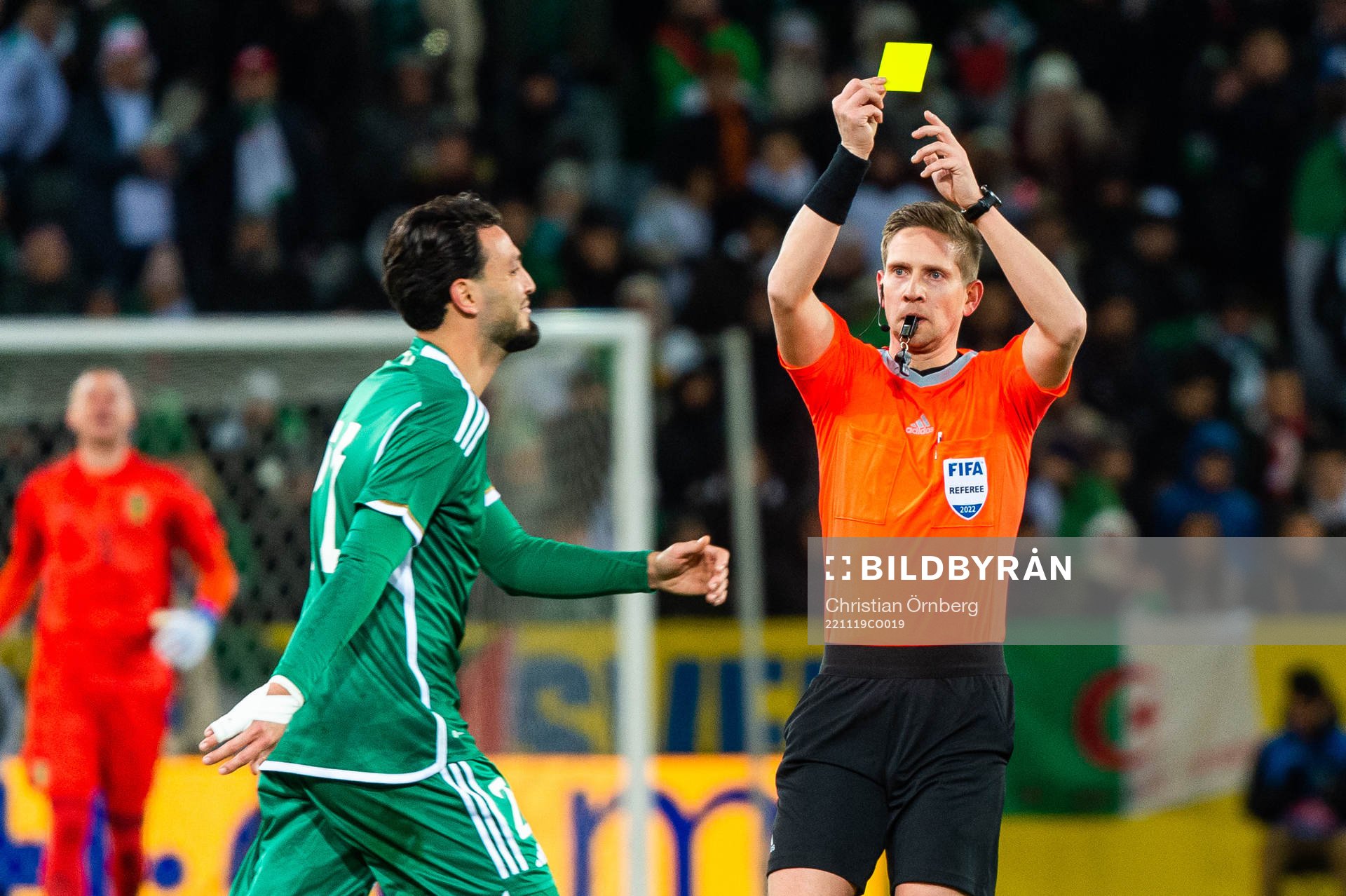 Ramy Bensebaini of Algeria receives a second yellow card