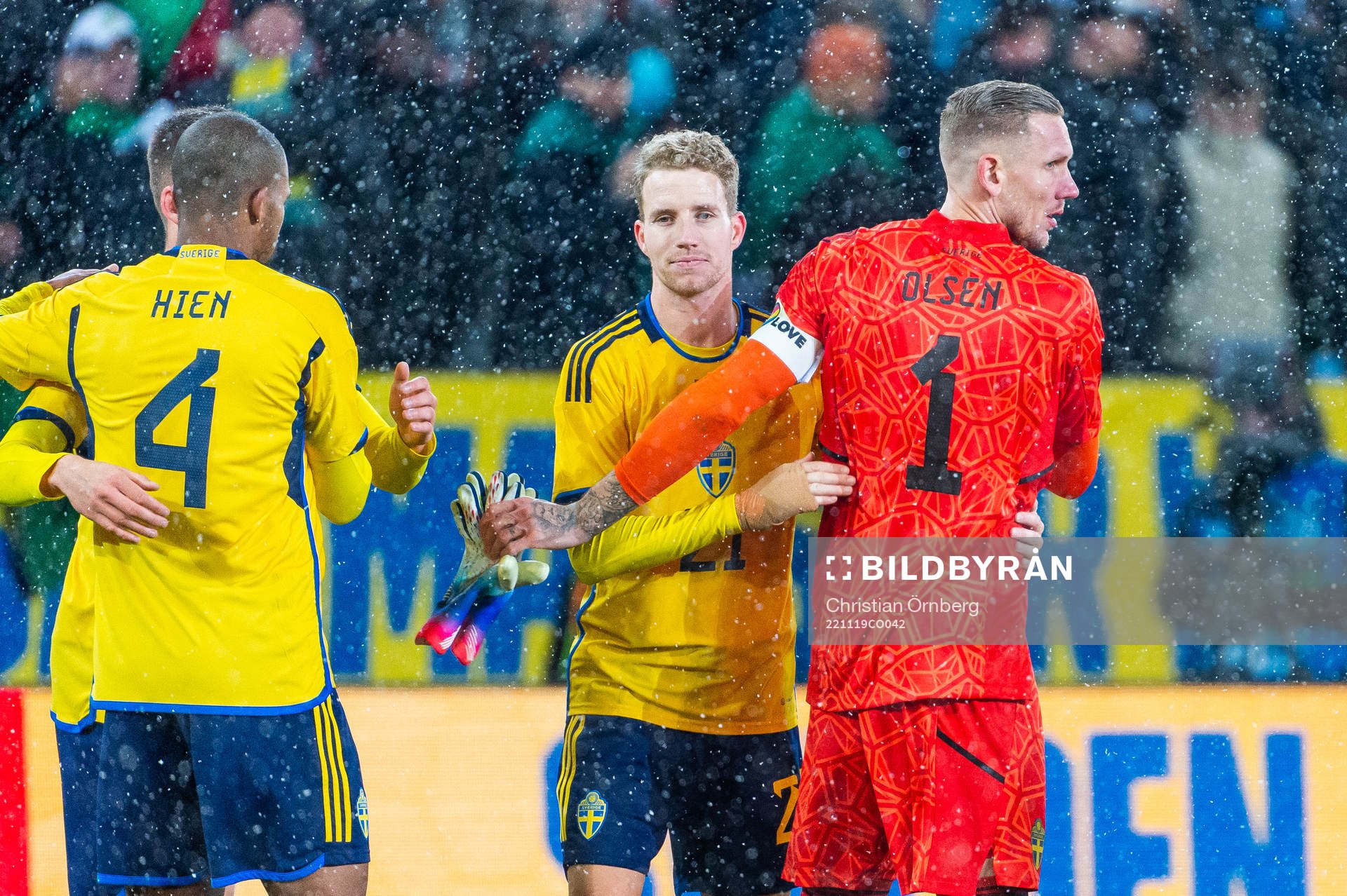 Samuel Gustafson and goalkeeper Robin Olsen of Sweden