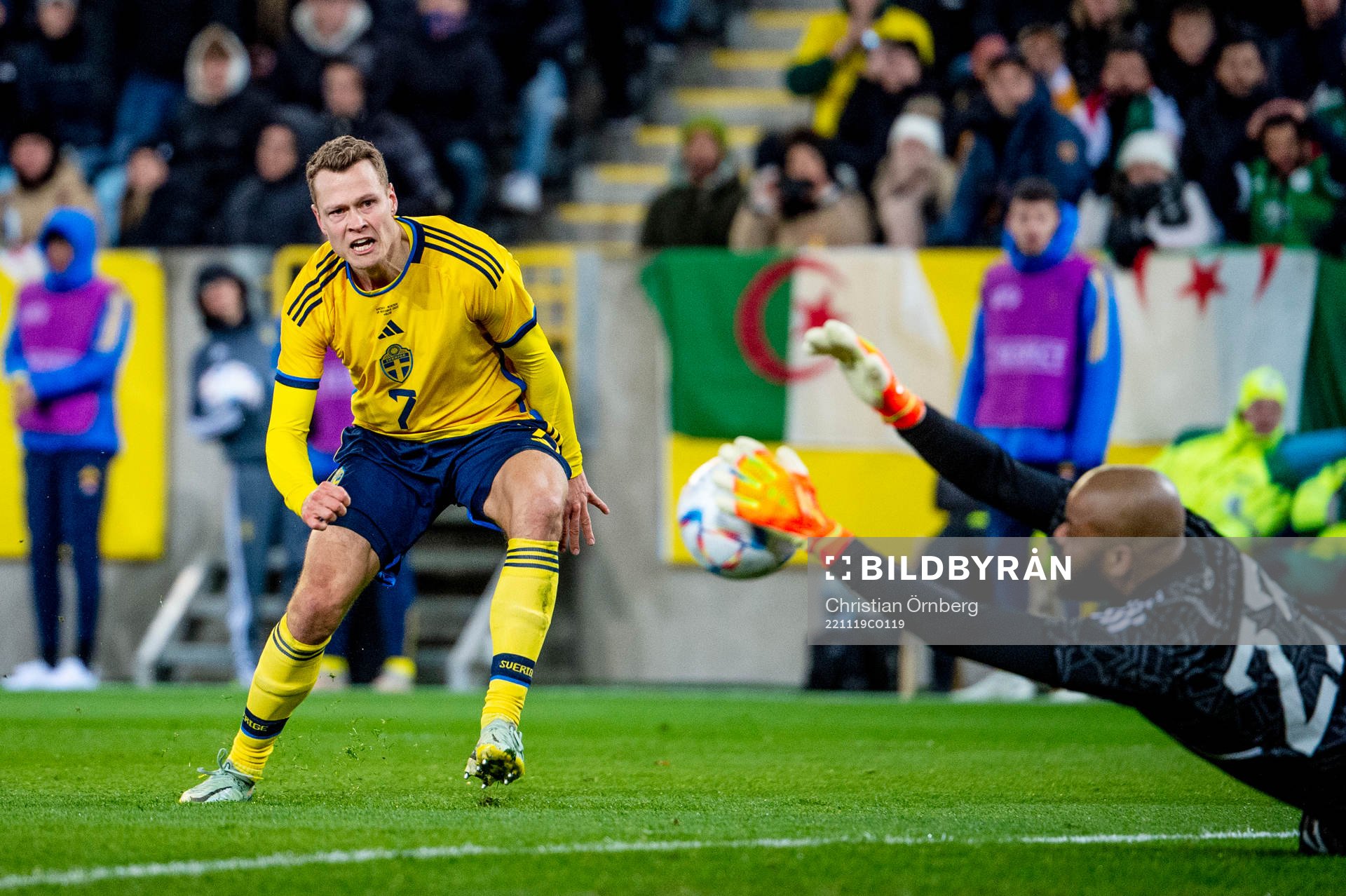 Viktor Claesson of Sweden and goalkeeper Rais Mbolhi of