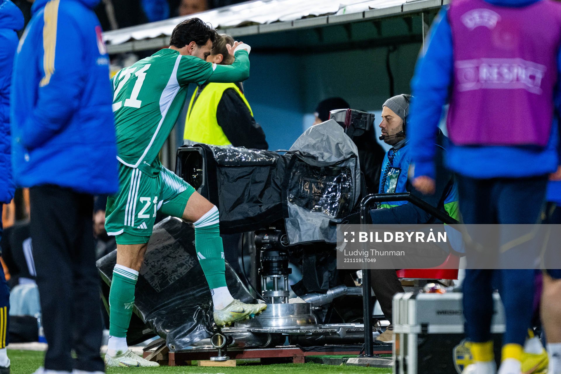 Ramy Bensebaini of Algeria reacts