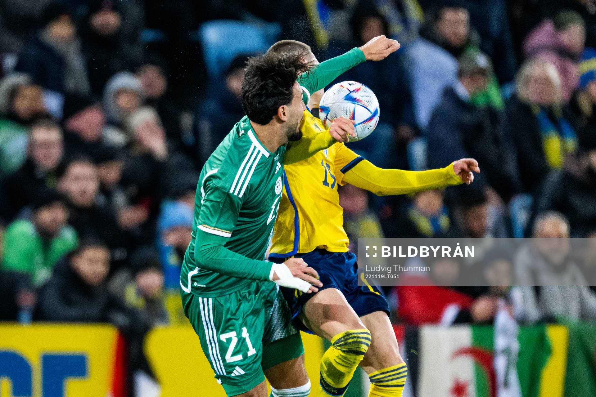 Ramy Bensebaini of Algeria and Mattias Svanberg of Sweden