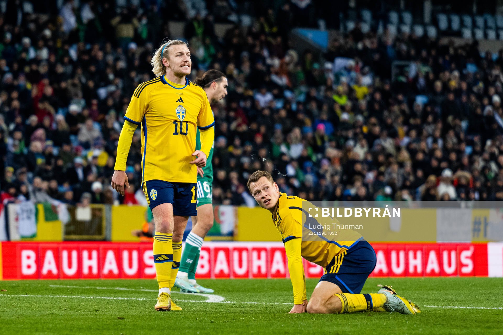 Emil Forsberg and Jesper Karlström of Sweden look dejected