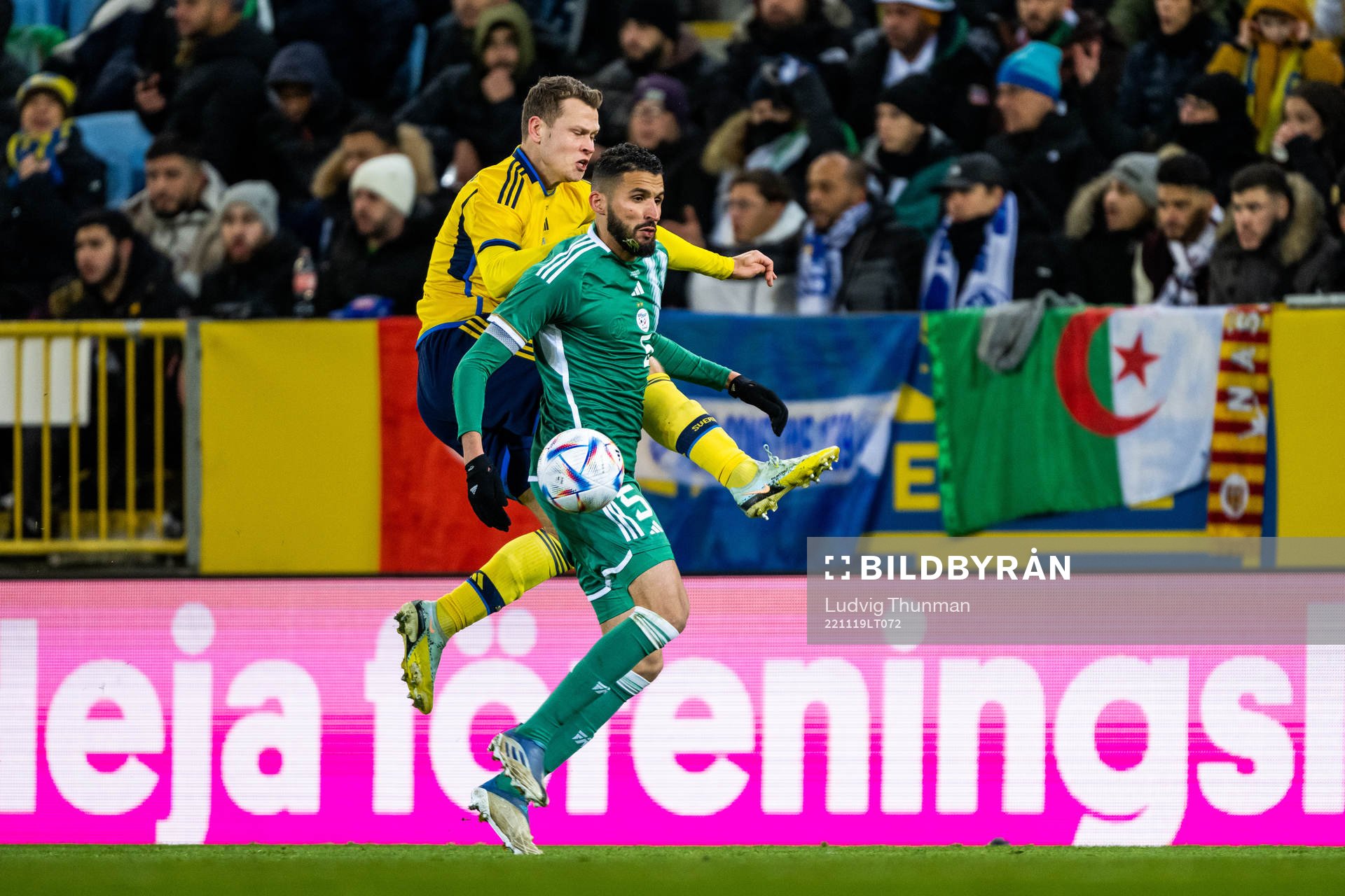 Viktor Claesson of Sweden and Ahmed Touba of Algeria during the international friendly football match between Sweden and Algeria on November 19, 2022 in Malmö. 