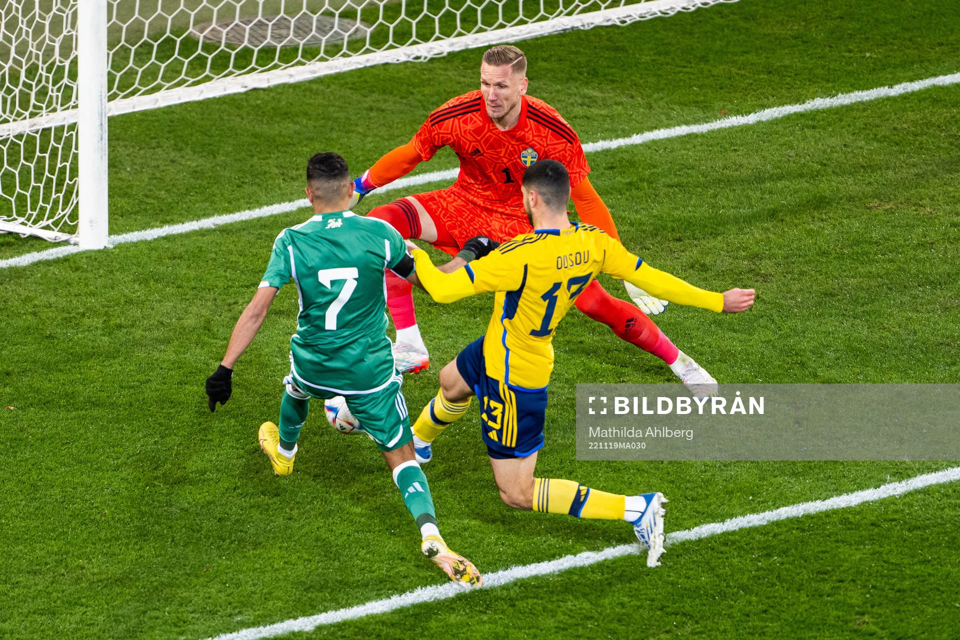 Riyad Mahrez of Algeria attacks against goalkeeper Robin