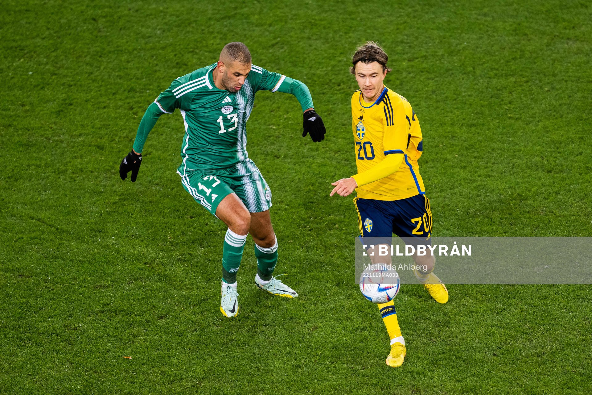 Islam Slimani of Algeria and Kristoffer Olsson of Sweden