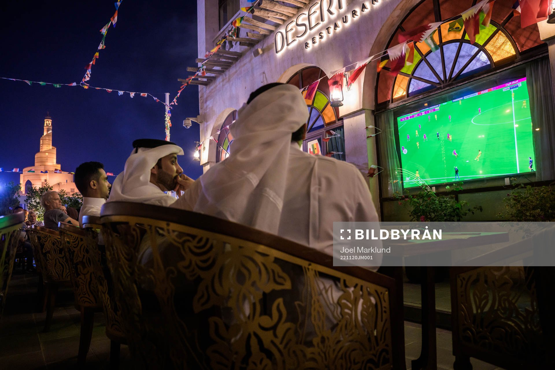 People watch the FIFA World Cup 2022 football match between