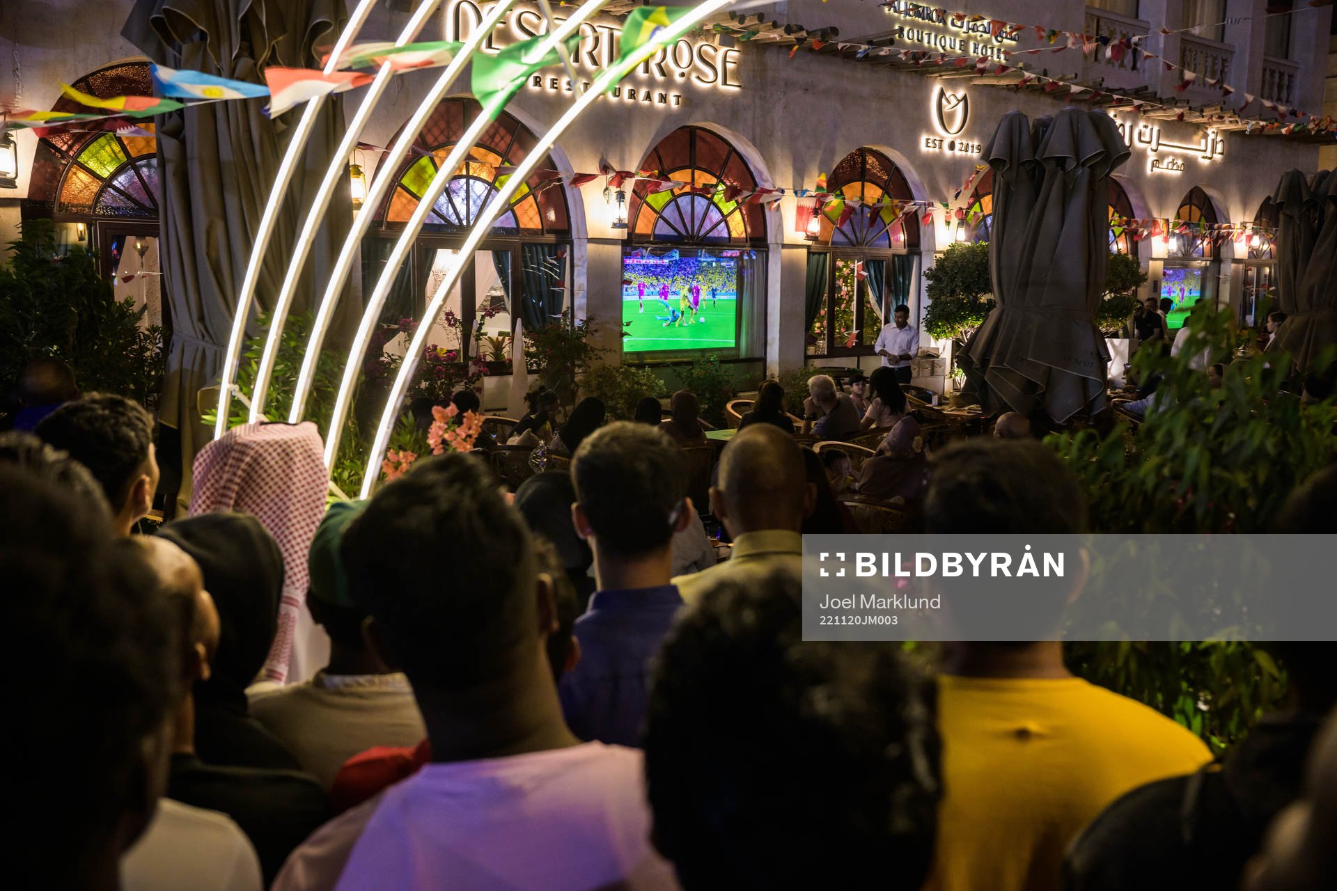 People watch the FIFA World Cup 2022 football match between