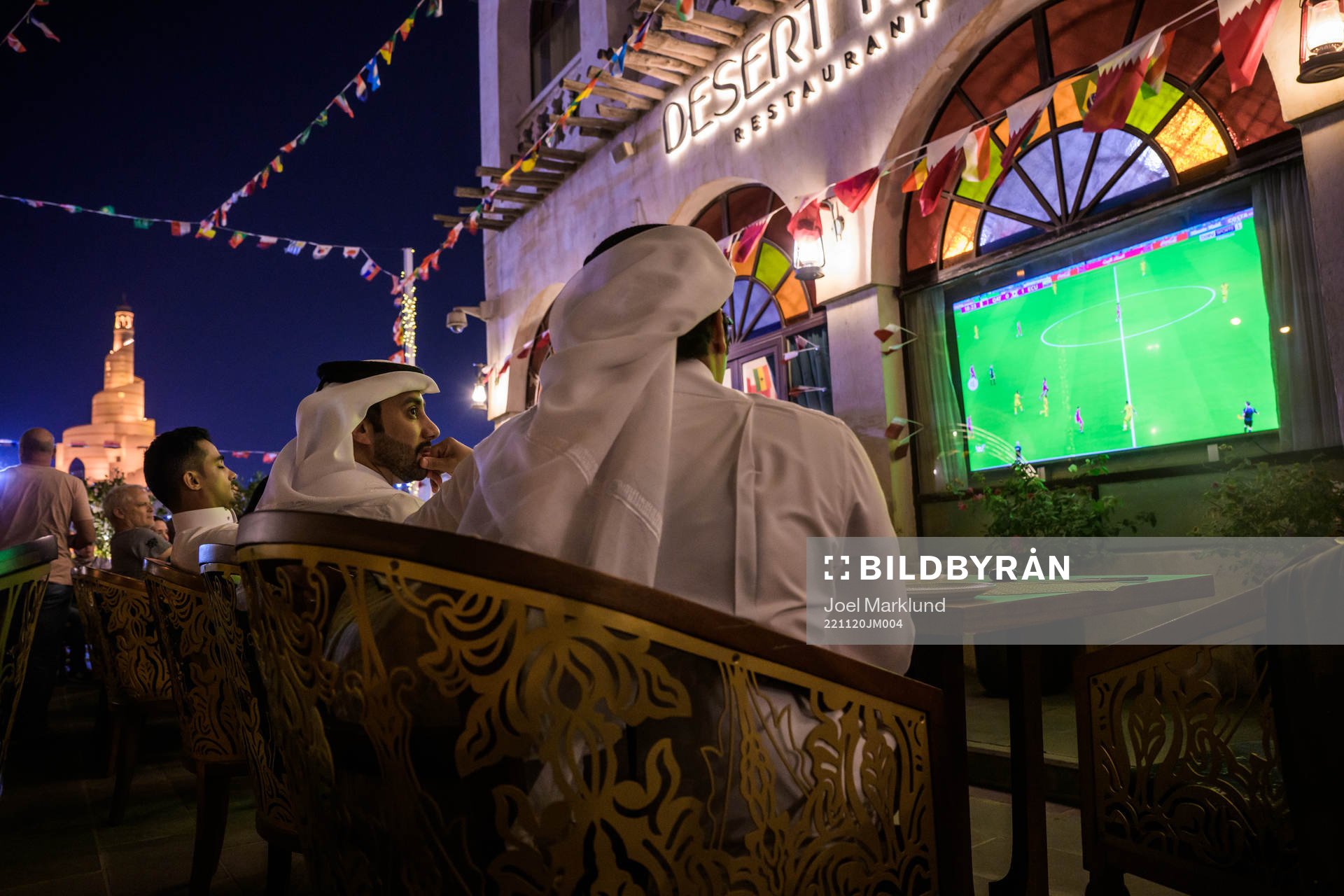 People watch the FIFA World Cup 2022 football match between