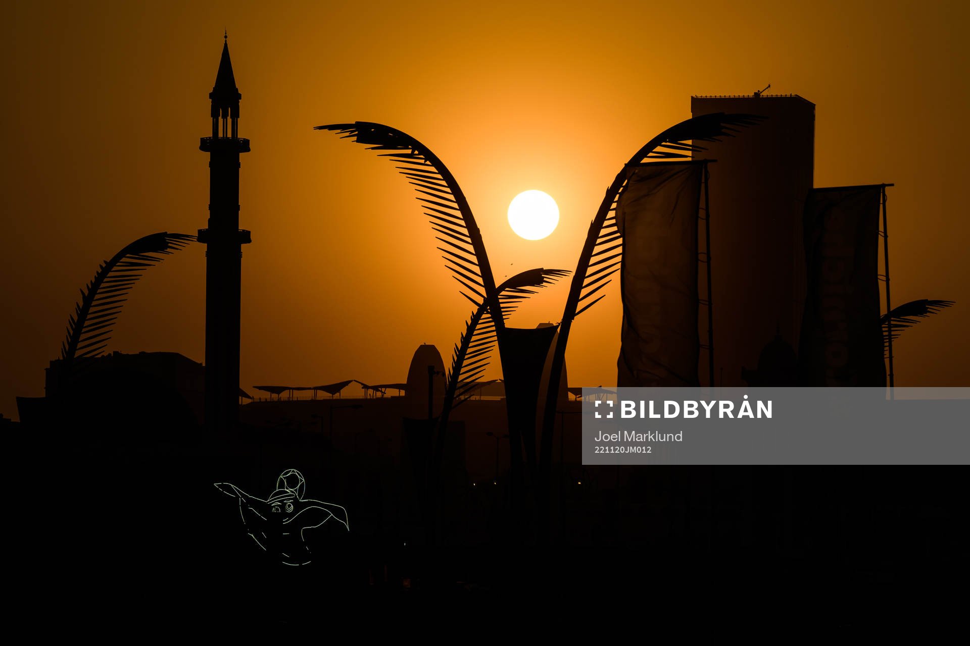 A light display of mascot La'eeb at sunset during day 1 of the FIFA World Cup 2022 on November 20, 2022 at Al Corniche in Doha.