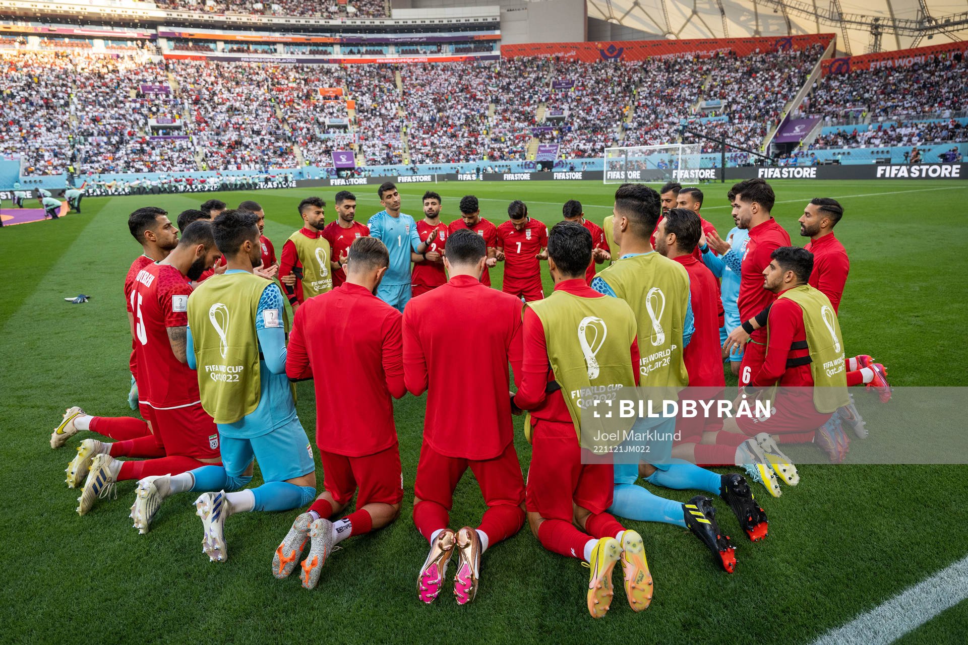 Players of Iran pray