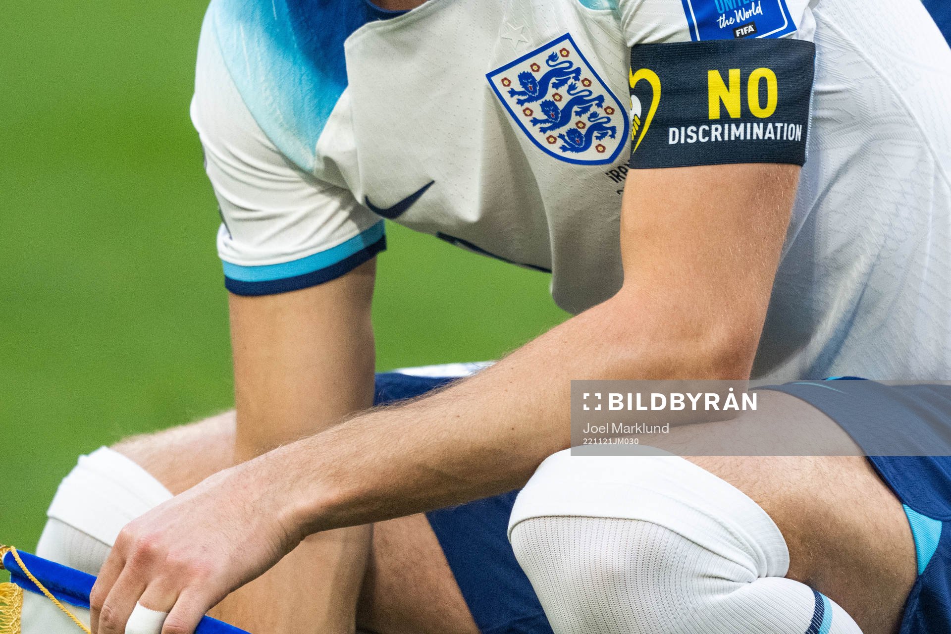 Harry Kane of England with the No Discrimination captain