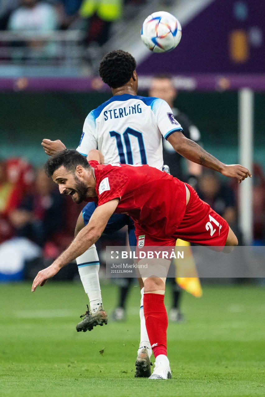 Phil Foden of England and Ahmad Noorollahi of Iran