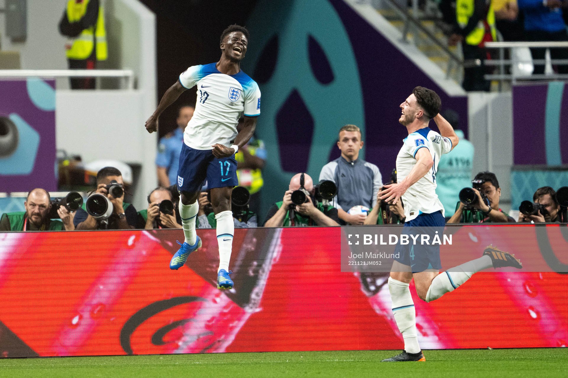 Bukayo Saka and Declan Rice of England celebrate 2-0 during the FIFA World Cup 2022 football match between England and Iran on November 21, 2022 in Doha.