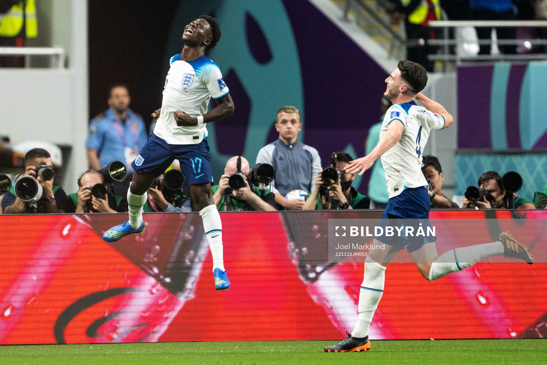 Bukayo Saka and Declan Rice of England celebrate 2-0 during the FIFA World Cup 2022 football match between England and Iran on November 21, 2022 in Doha.